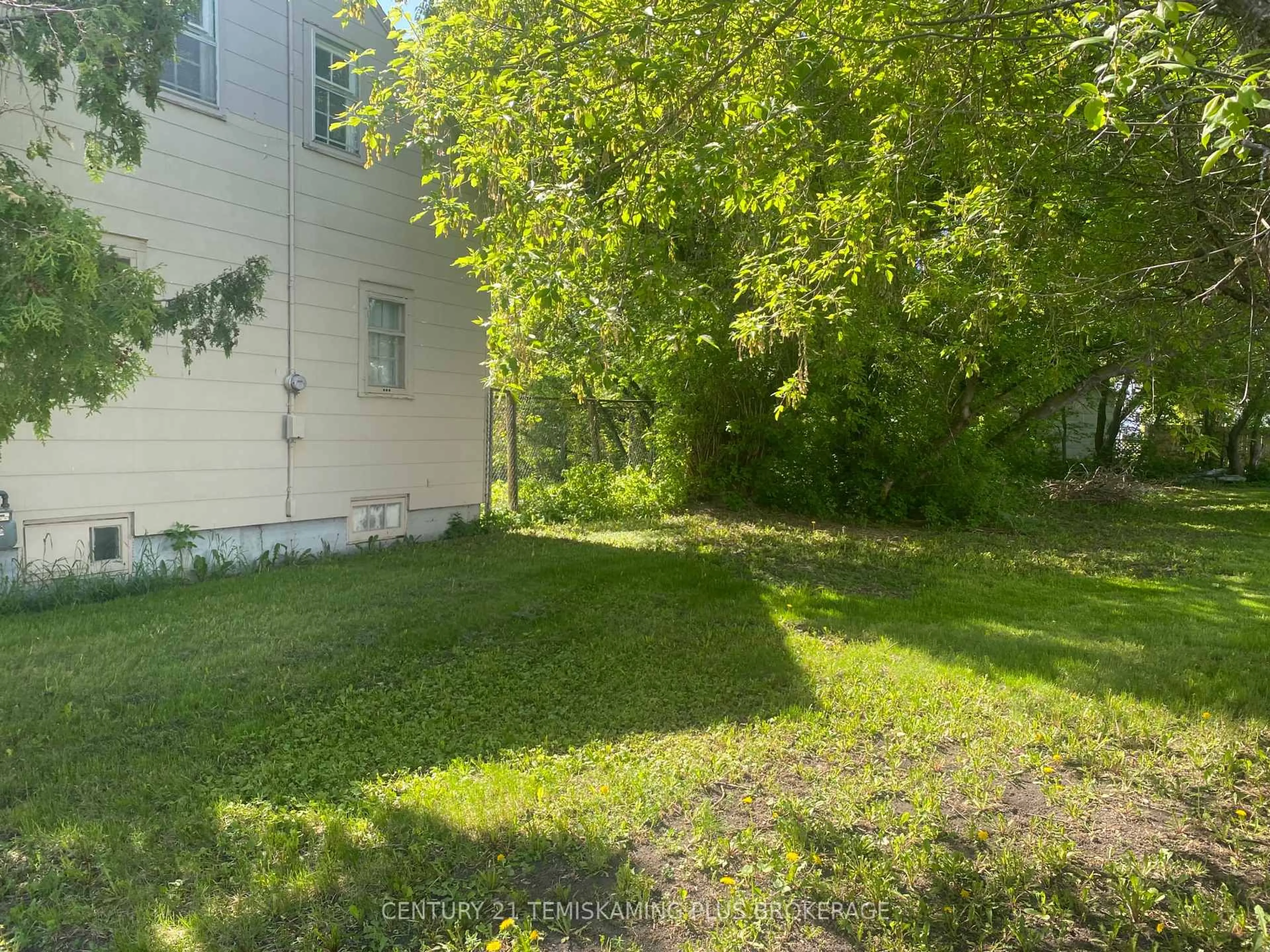 A pic from outside/outdoor area/front of a property/back of a property/a pic from drone, unknown for 408 Grills St, Temiskaming Shores Ontario P0J 1P0