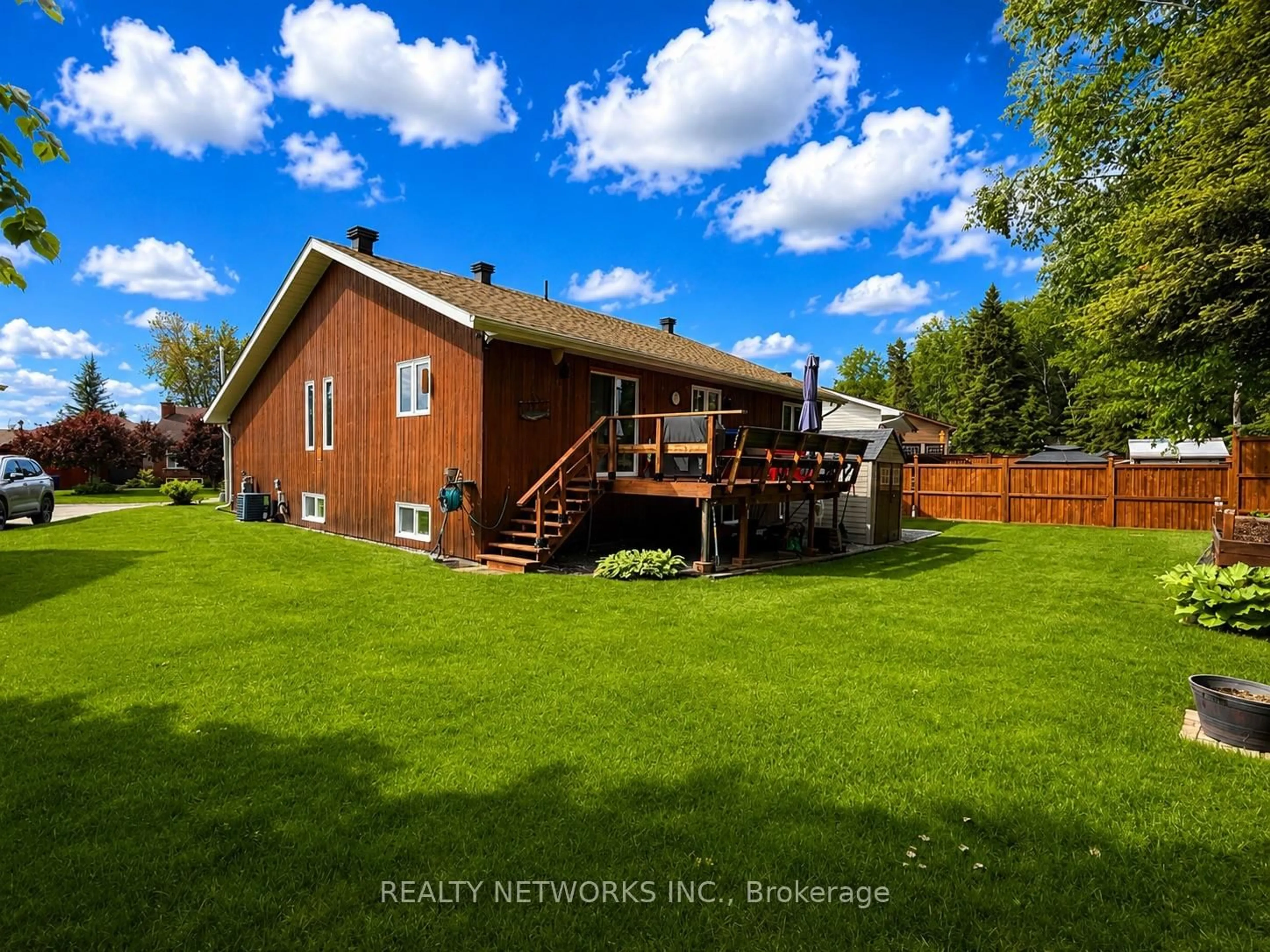 A pic from outside/outdoor area/front of a property/back of a property/a pic from drone, water/lake/river/ocean view for 104 Bergeron Crt, Timmins Ontario P0N 1K0