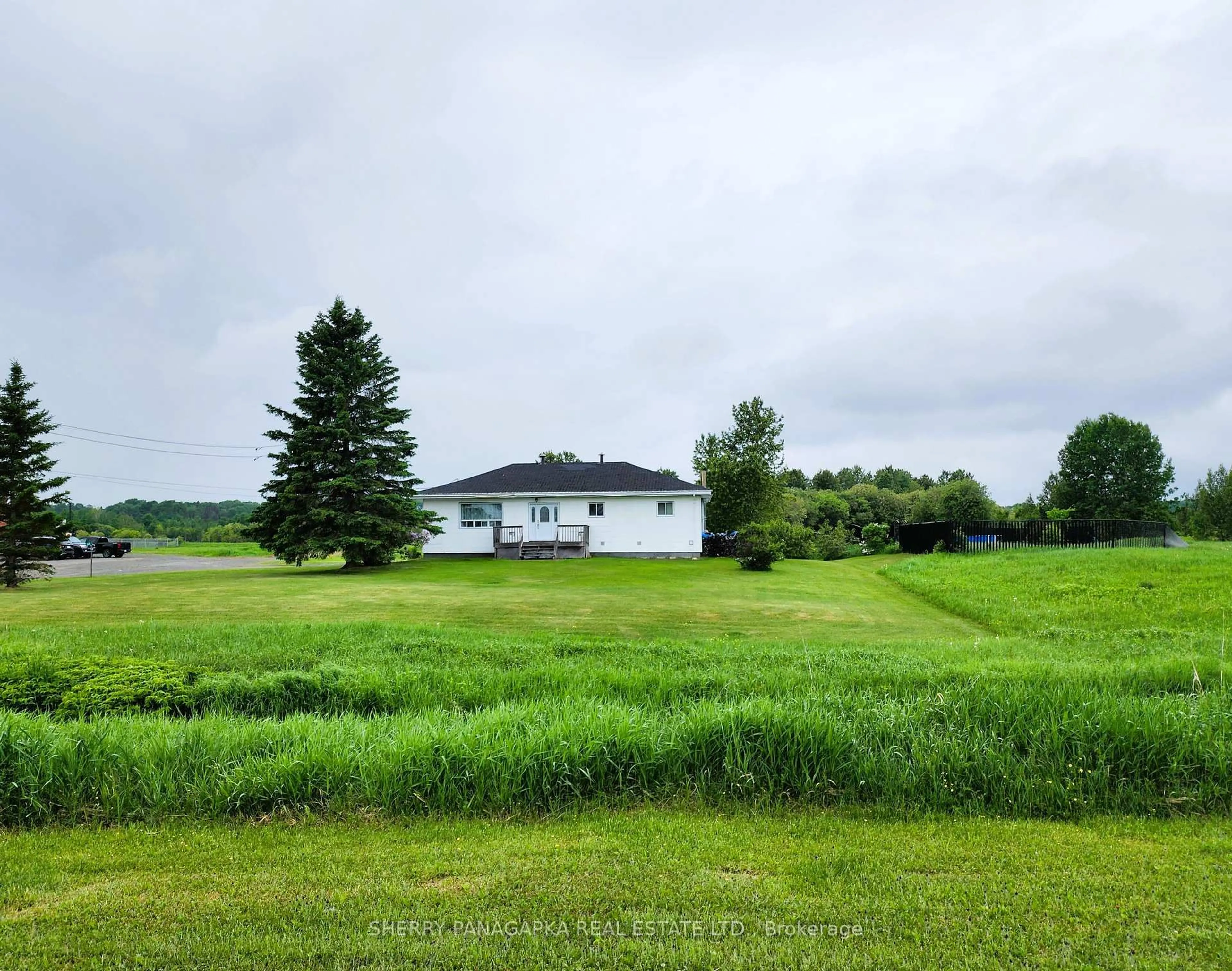 A pic from outside/outdoor area/front of a property/back of a property/a pic from drone, water/lake/river/ocean view for 68 Fourth Ave, Kirkland Lake Ontario P0K 1L0