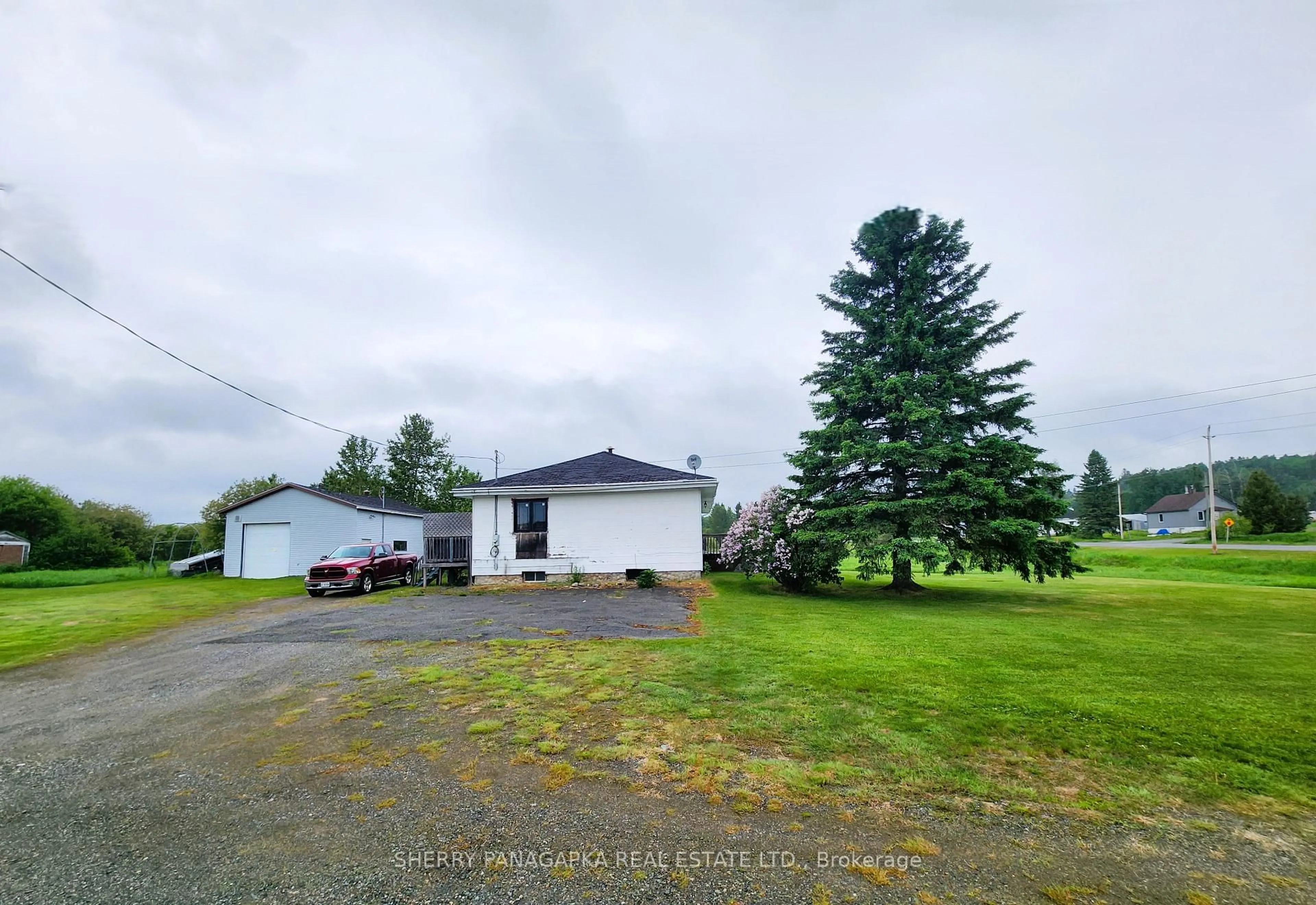 A pic from outside/outdoor area/front of a property/back of a property/a pic from drone, unknown for 68 Fourth Ave, Kirkland Lake Ontario P0K 1L0