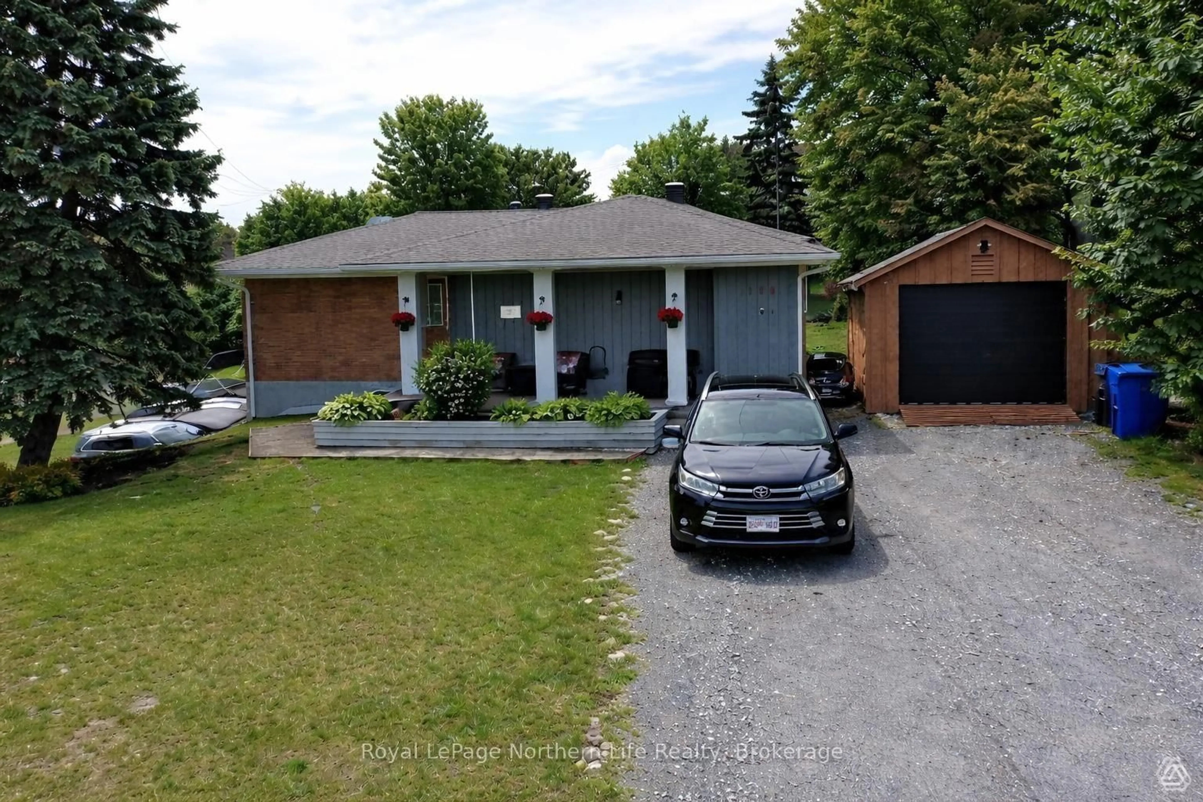 A pic from outside/outdoor area/front of a property/back of a property/a pic from drone, street for 224 ELLIOTT St, Temiskaming Shores Ontario P0J 1K0
