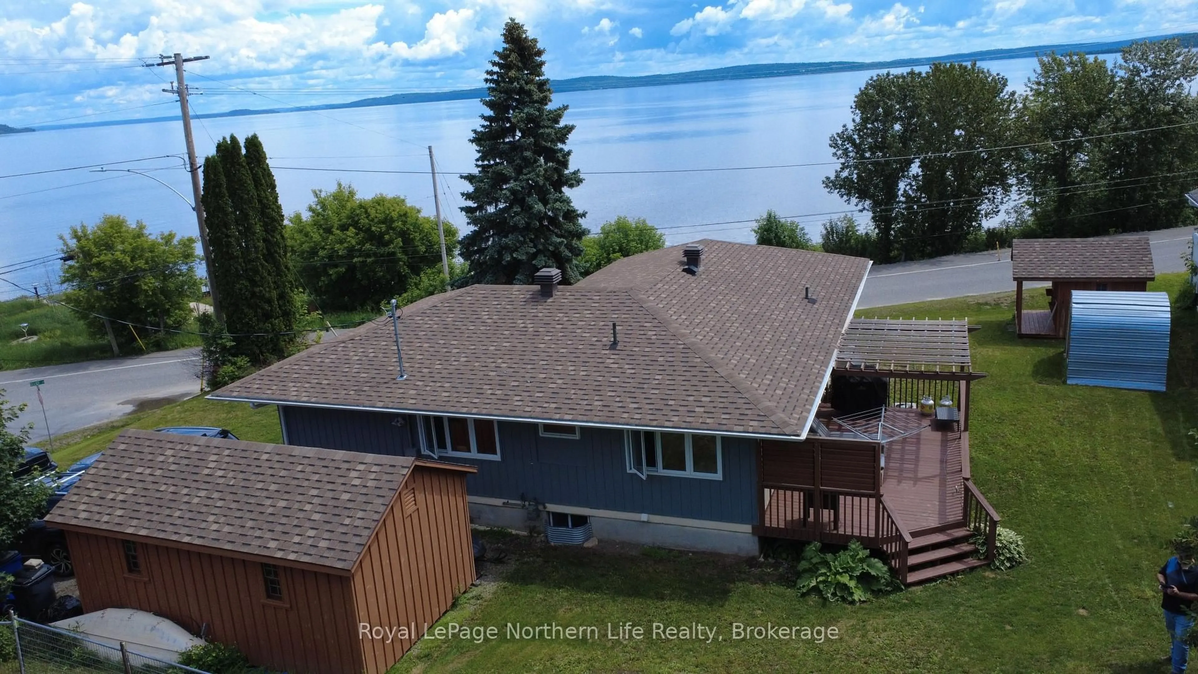 A pic from outside/outdoor area/front of a property/back of a property/a pic from drone, water/lake/river/ocean view for 224 ELLIOTT St, Temiskaming Shores Ontario P0J 1K0