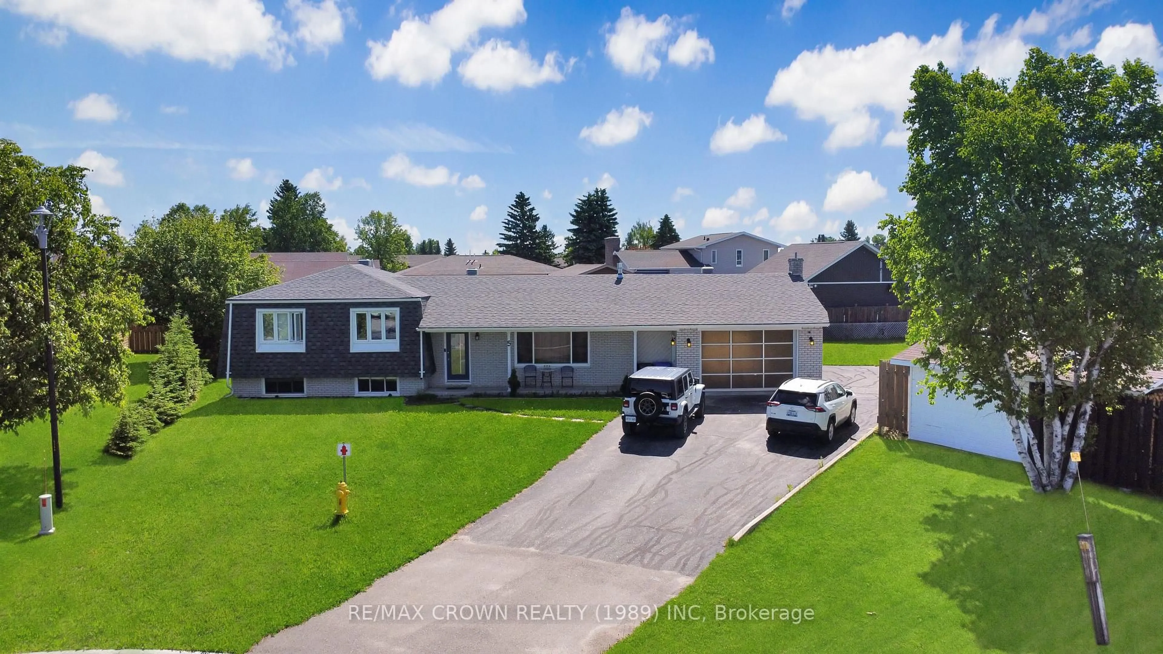 A pic from outside/outdoor area/front of a property/back of a property/a pic from drone, street for 5 Flood Pl, Hearst Ontario P0L 1N0