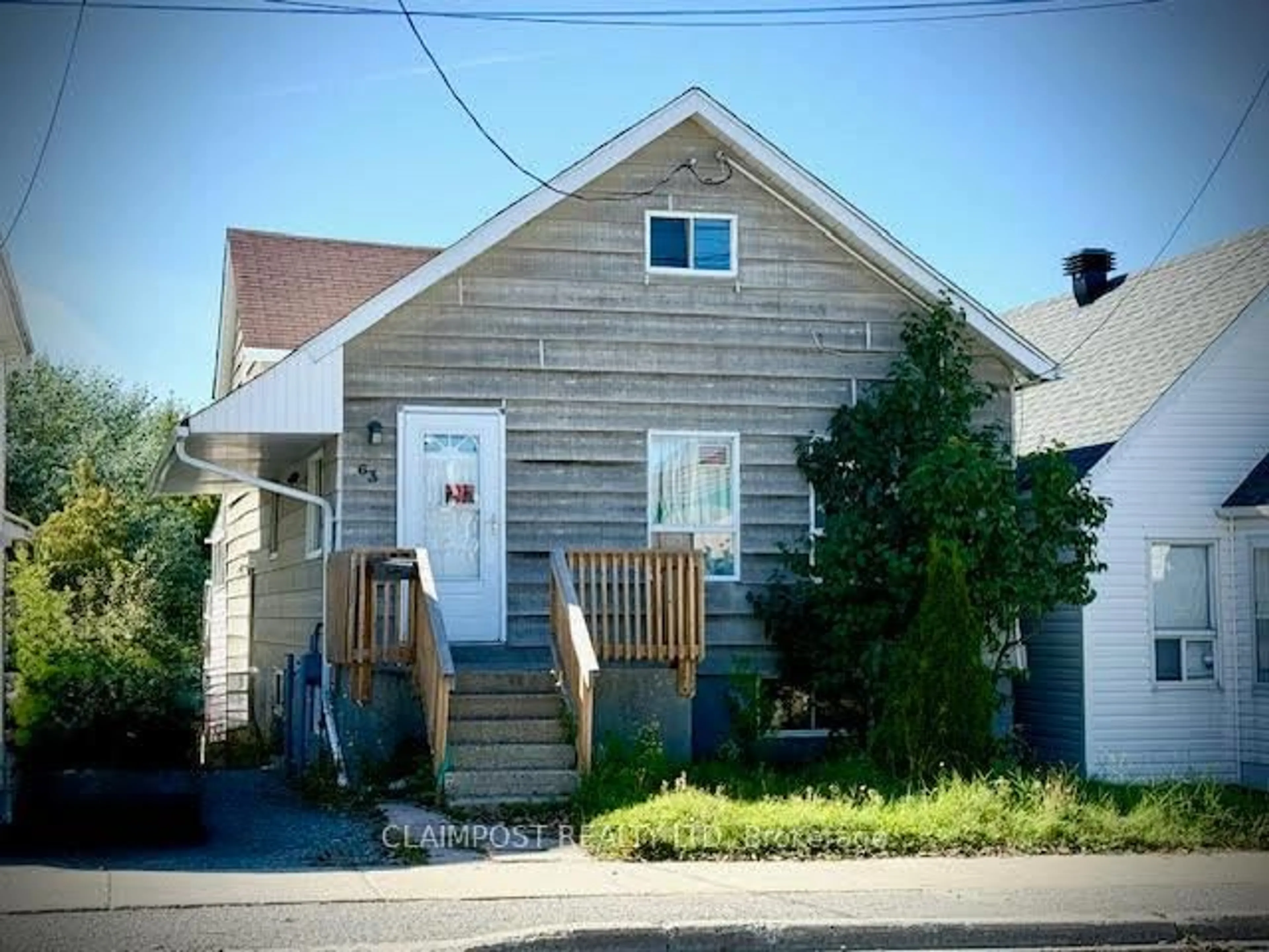 Home with vinyl exterior material, street for 63 Rea St, Timmins Ontario P4N 4Z5