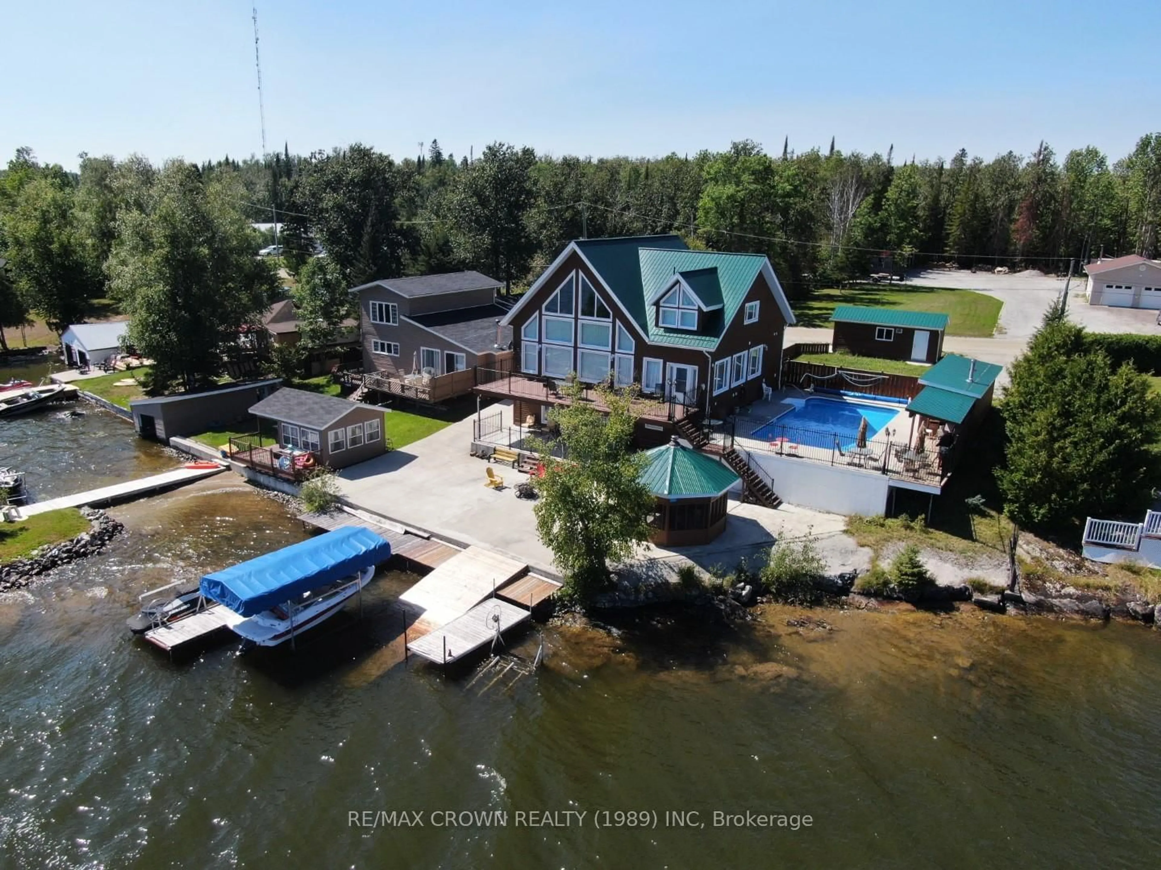 A pic from outside/outdoor area/front of a property/back of a property/a pic from drone, water/lake/river/ocean view for 177 Lefebvre Peninsula Rd #Moonbeam, Kapuskasing Ontario P0L 1V0