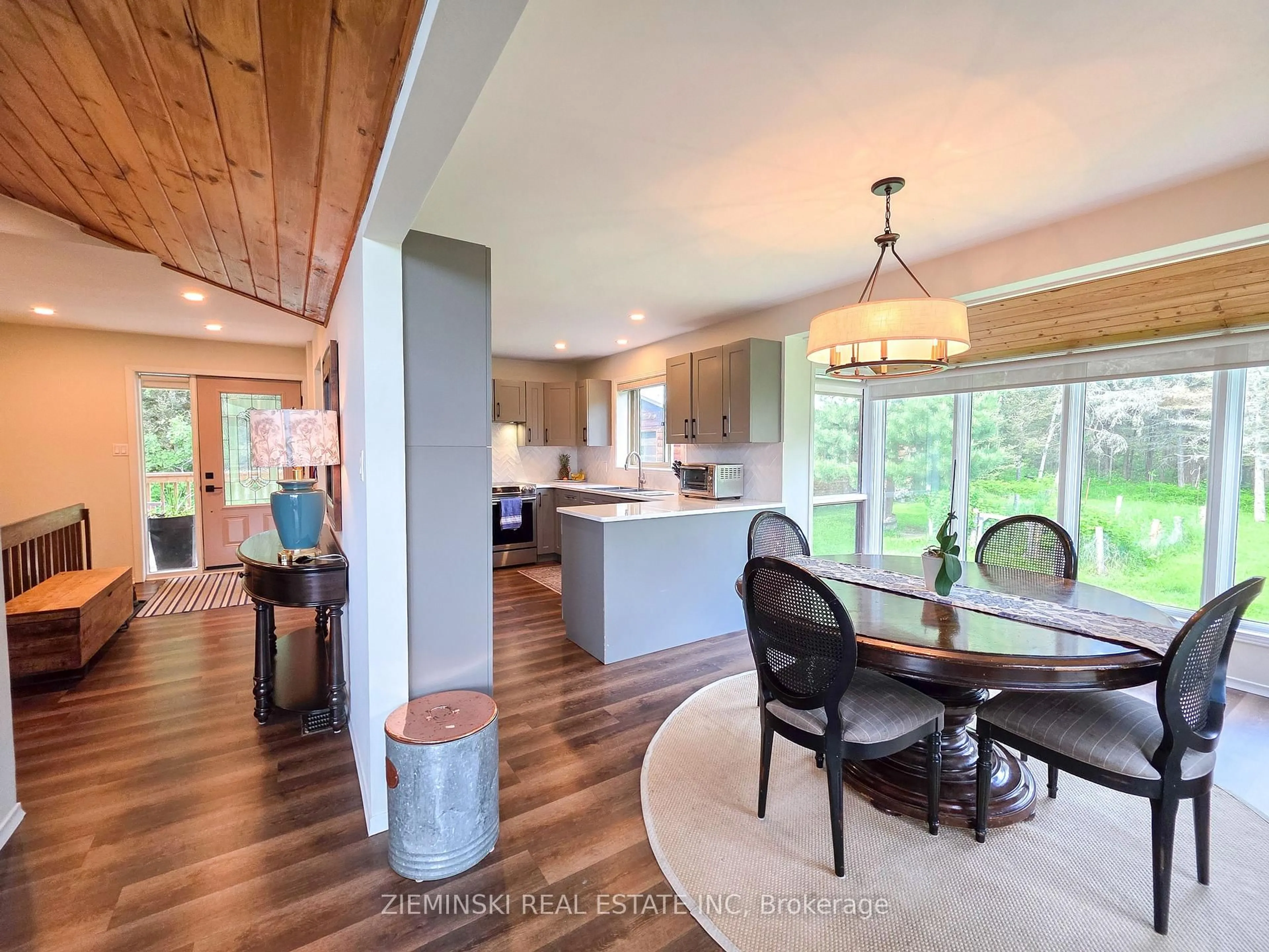 Open concept kitchen, wood/laminate floor for 134 HWY 570 Sesekinika, Kirkland Lake Ontario P0K 1S0