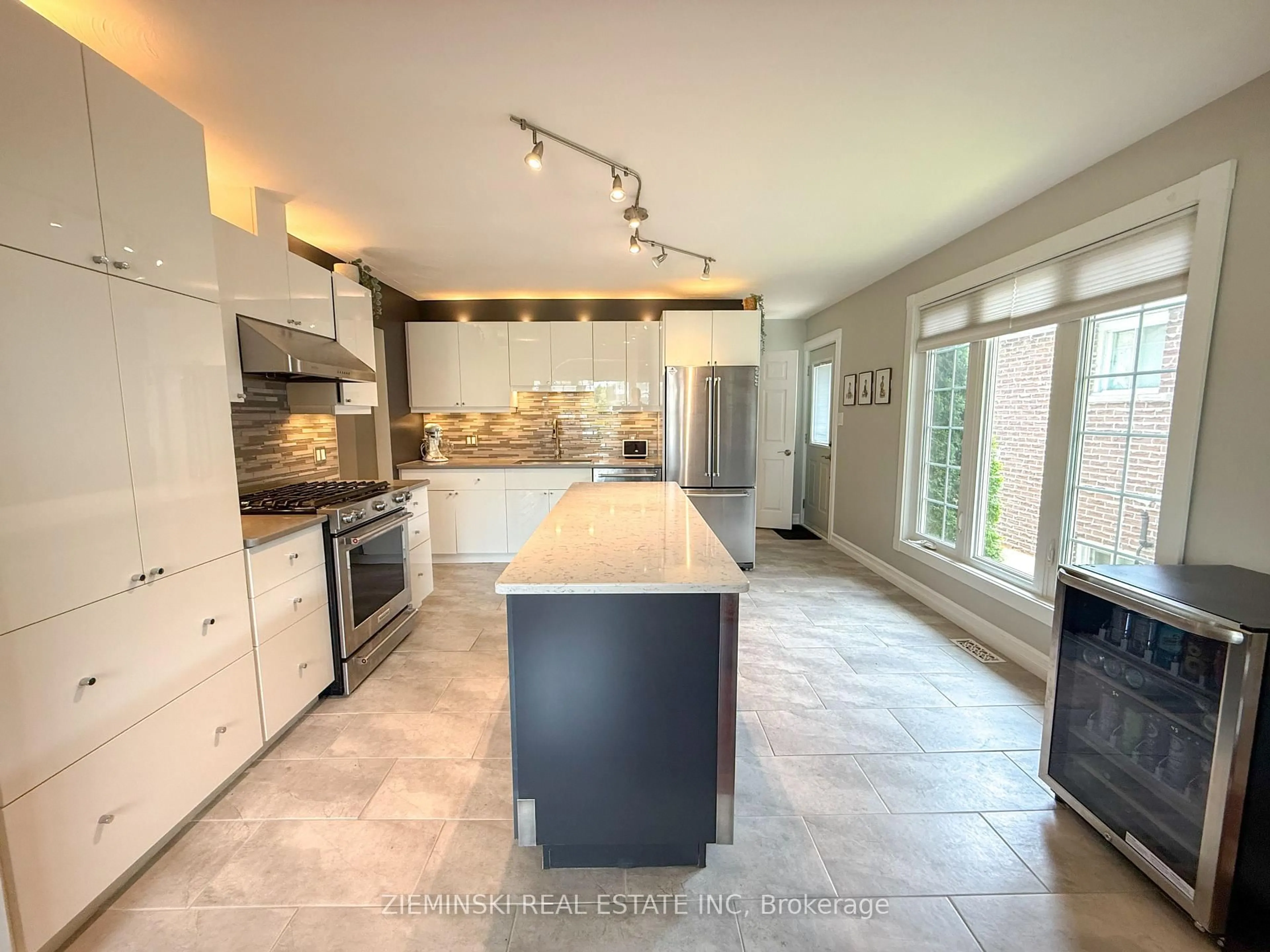 Open concept kitchen, ceramic/tile floor for 397 Morandin Ave, Timmins Ontario P4N 7R5