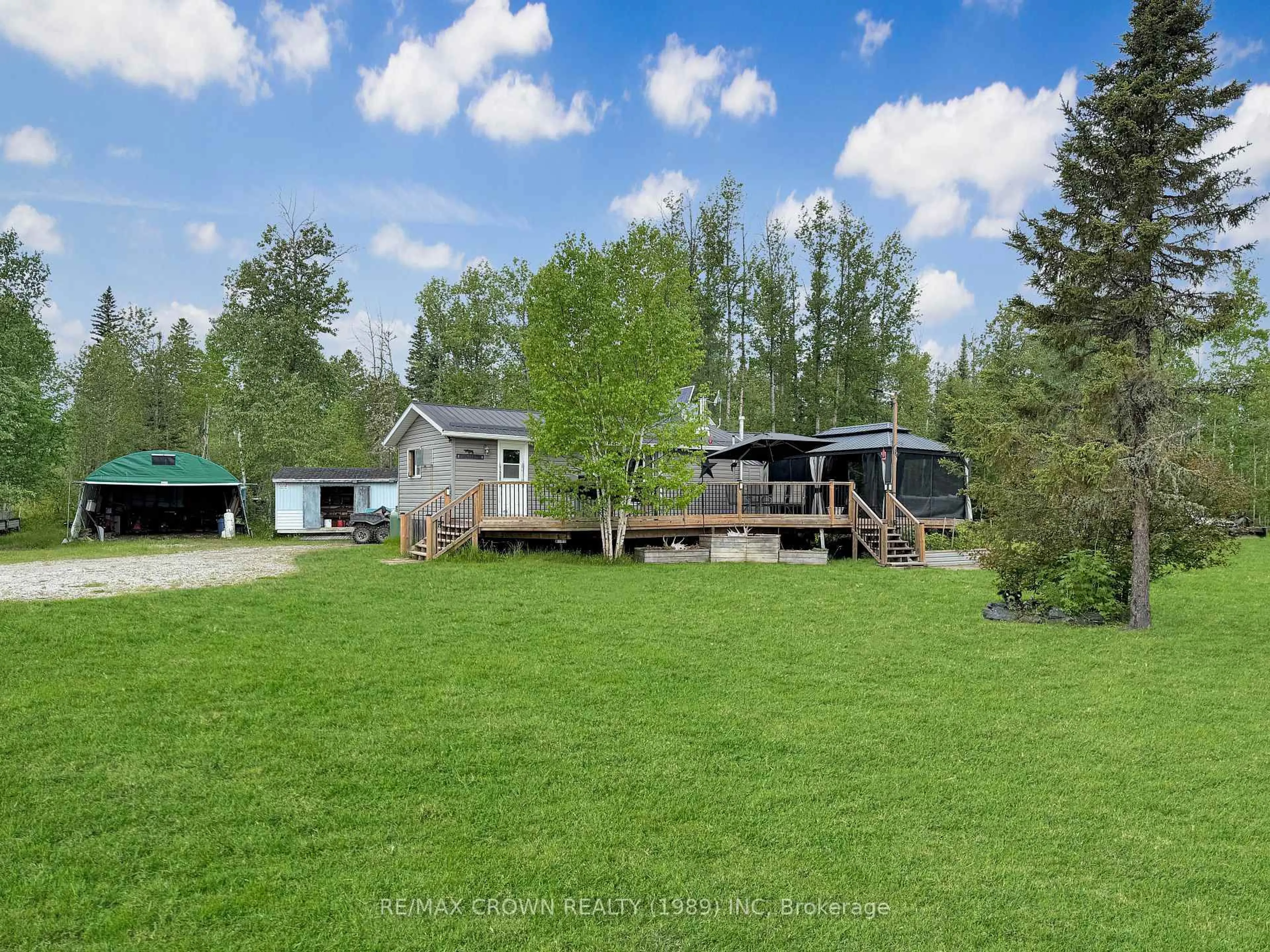 A pic from outside/outdoor area/front of a property/back of a property/a pic from drone, unknown for 11 Lac Brochet Rd #Moonbeam, Kapuskasing Ontario P0L 1V0