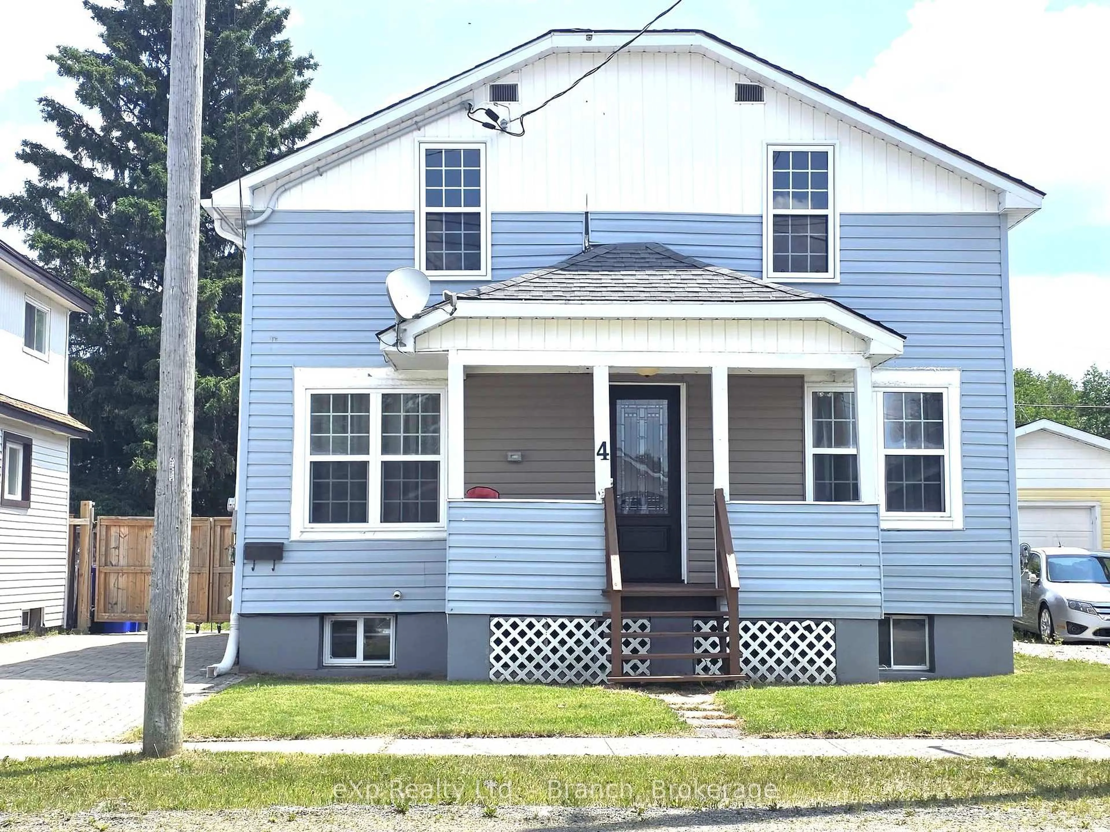 Home with vinyl exterior material, street for 4 Baron St, Kirkland Lake Ontario P2N 2Y2