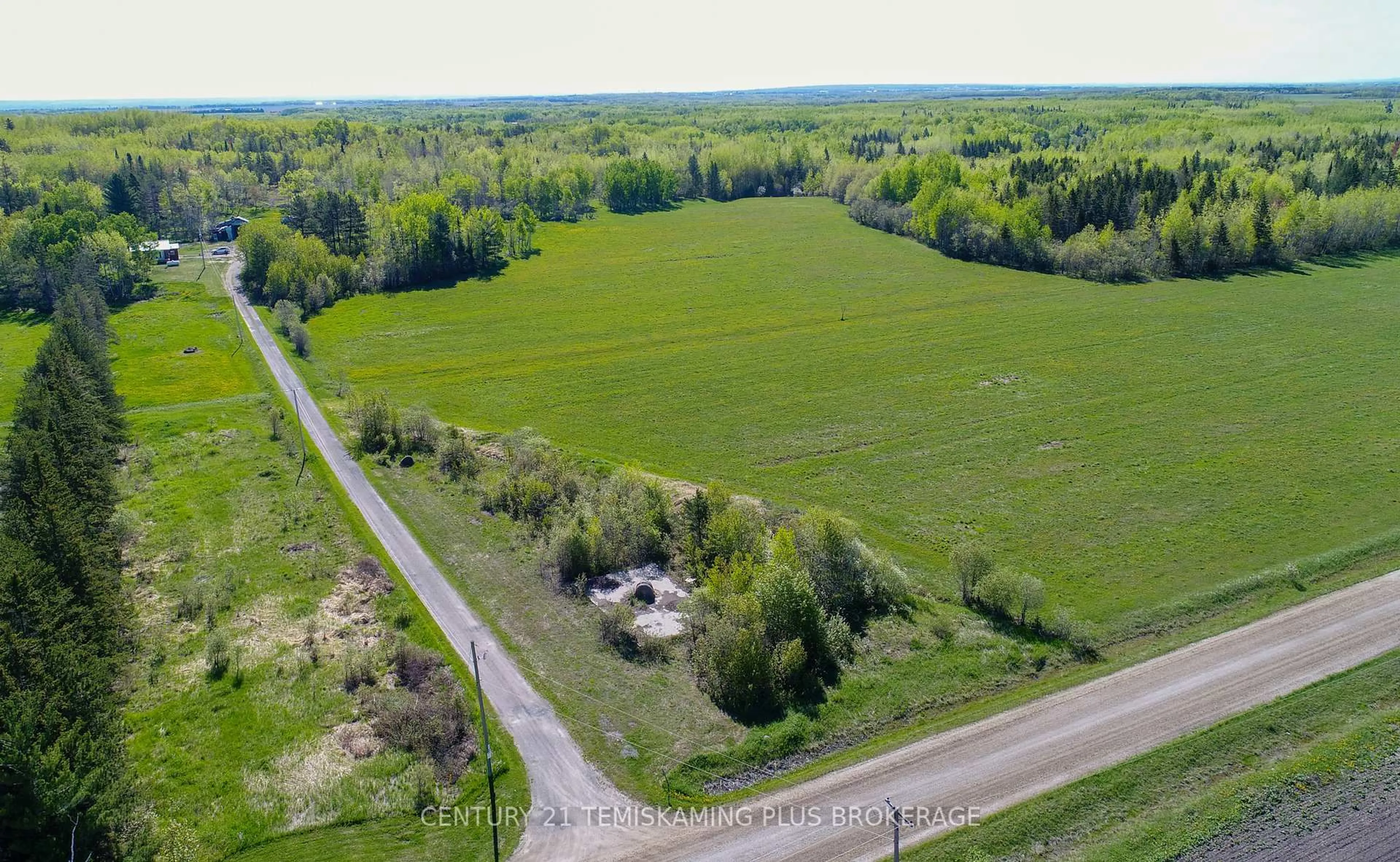 A pic from outside/outdoor area/front of a property/back of a property/a pic from drone, unknown for 533205 River Rd, Englehart Ontario P0J 1H0