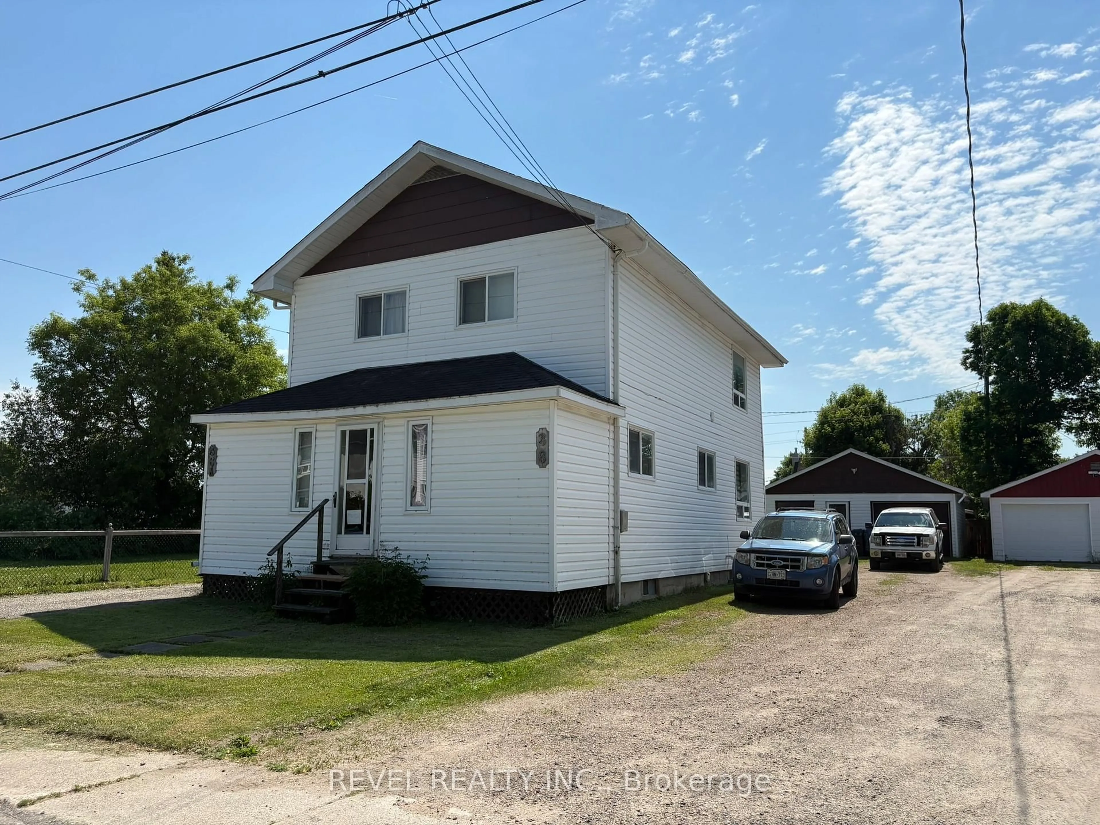 A pic from outside/outdoor area/front of a property/back of a property/a pic from drone, building for 36 Stewart Ave, Kapuskasing Ontario P5N 1S2