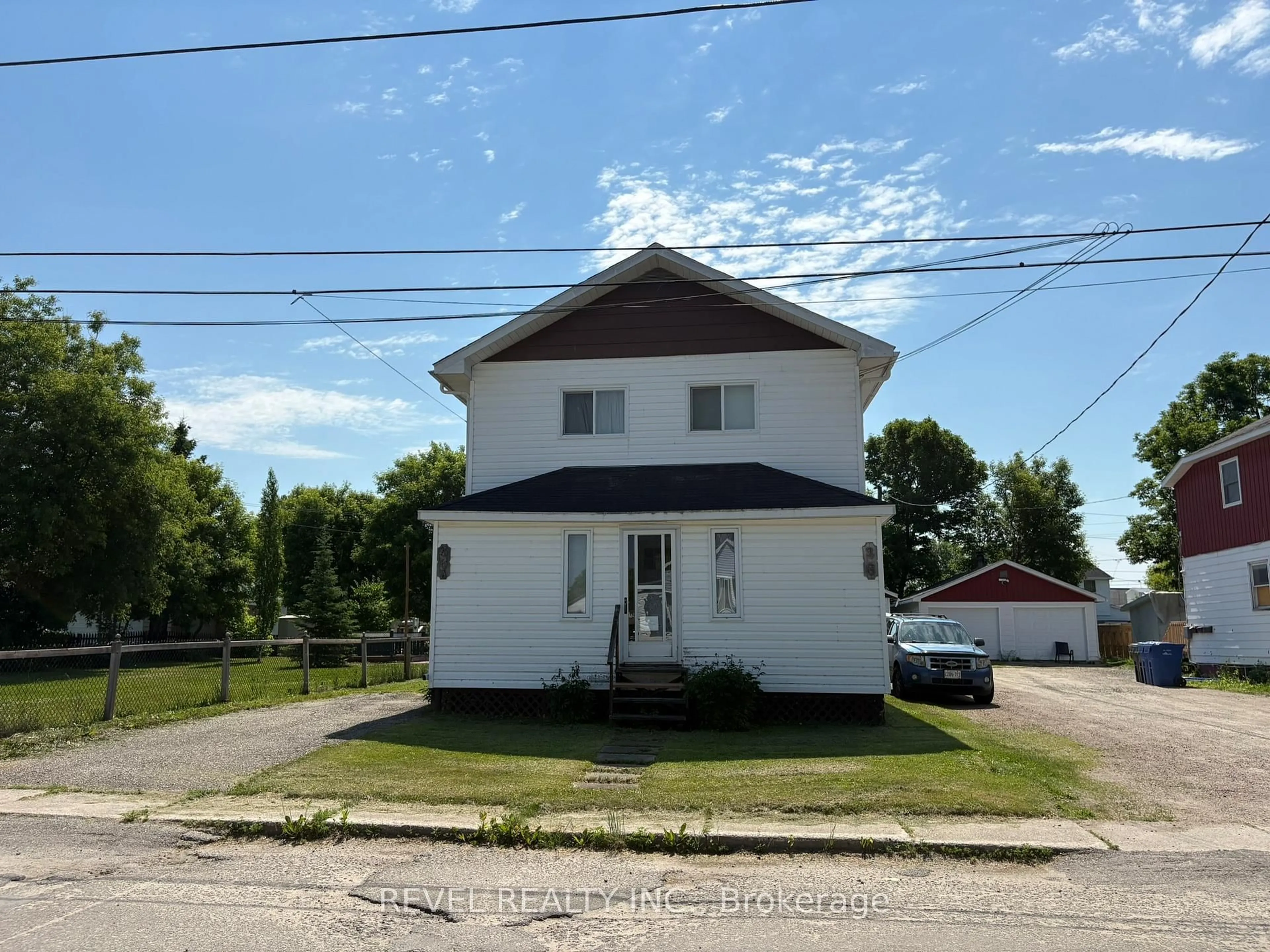 A pic from outside/outdoor area/front of a property/back of a property/a pic from drone, building for 36 Stewart Ave, Kapuskasing Ontario P5N 1S2