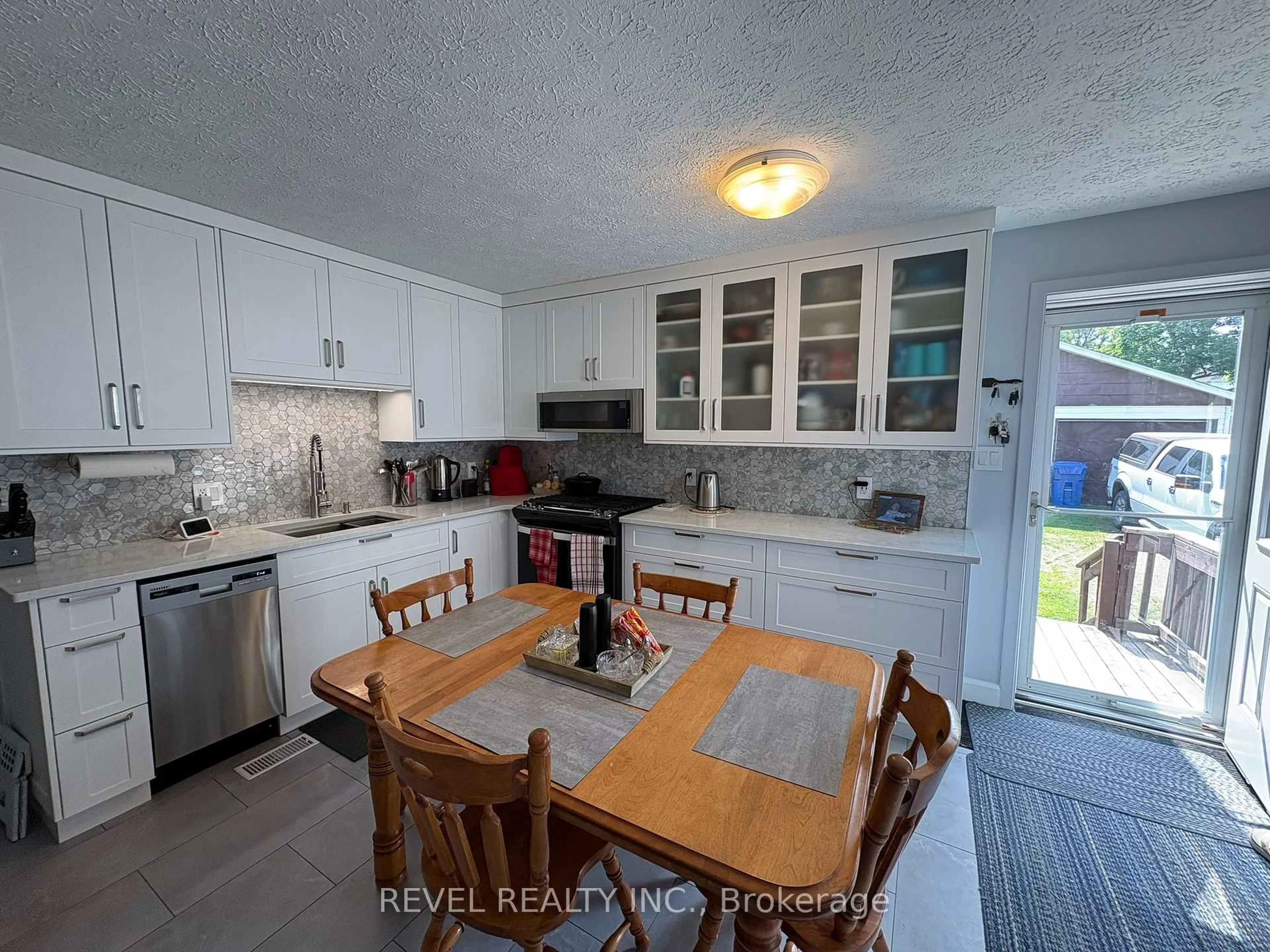 Open concept kitchen, ceramic/tile floor for 36 Stewart Ave, Kapuskasing Ontario P5N 1S2
