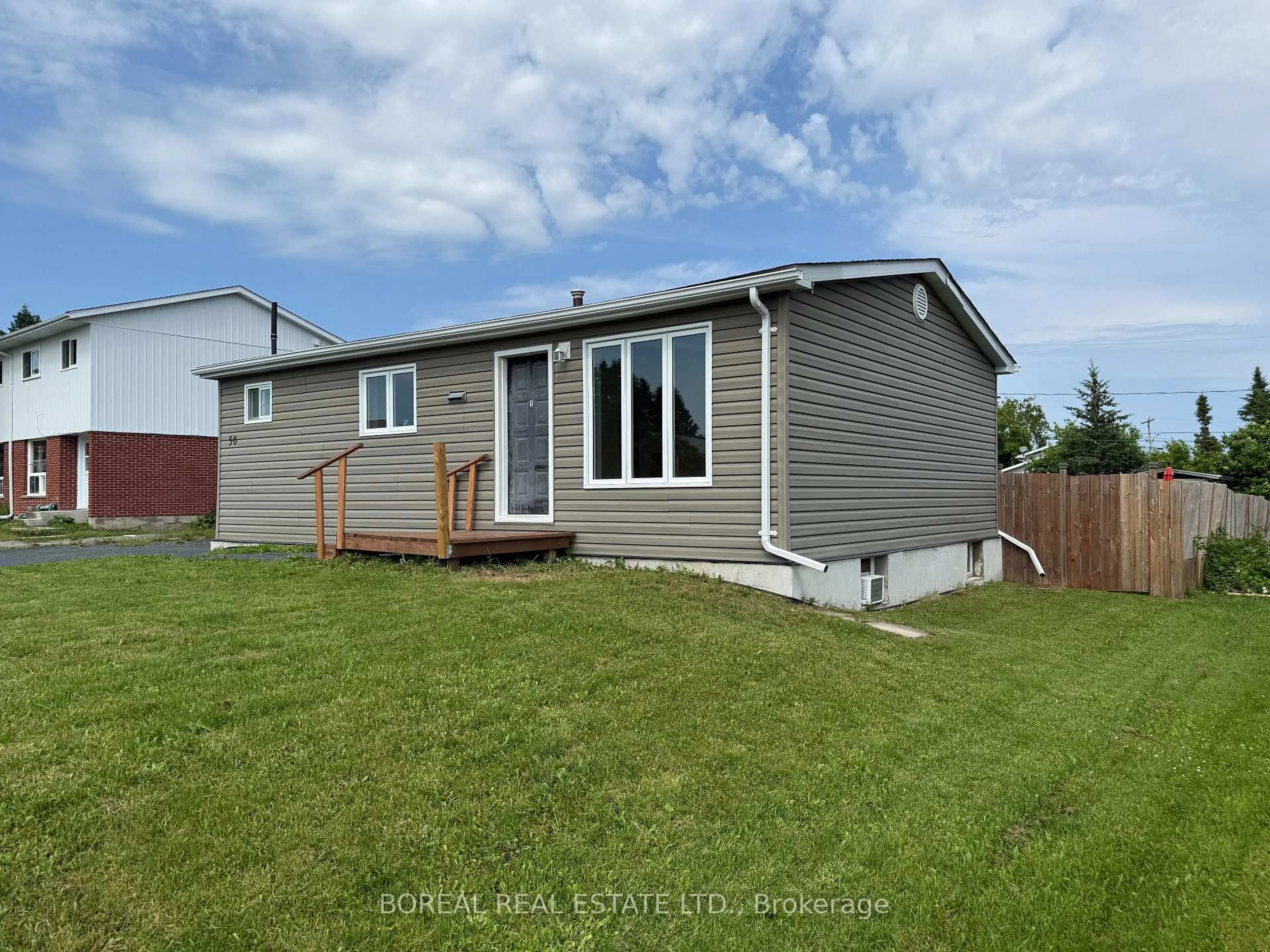 Home with vinyl exterior material, unknown for 50 Victoria Ave, Cochrane Ontario P0L 1C0