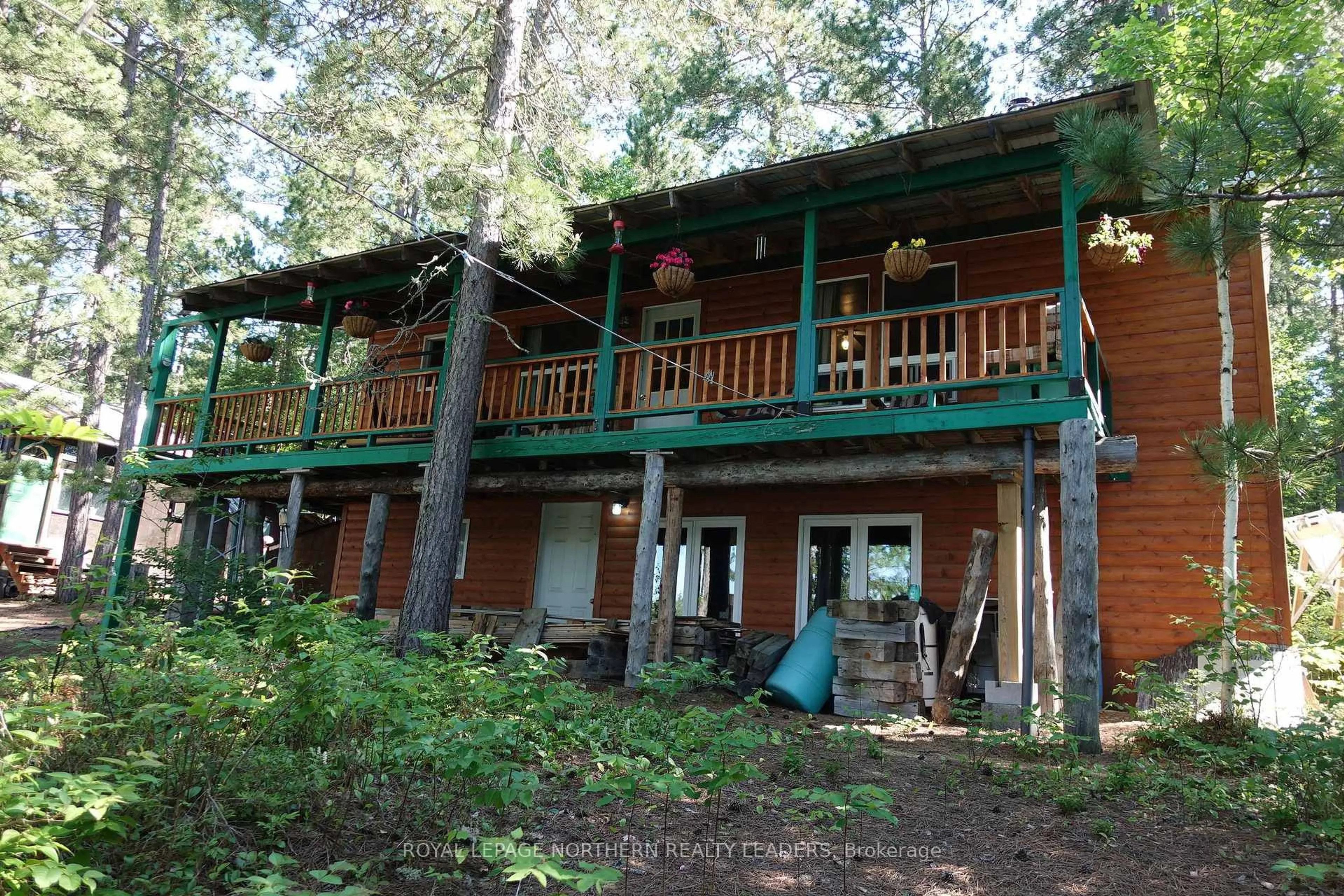 A pic from outside/outdoor area/front of a property/back of a property/a pic from drone, forest/trees view for 401 Patels Rd, Kirkland Lake Ontario P4N 2G4