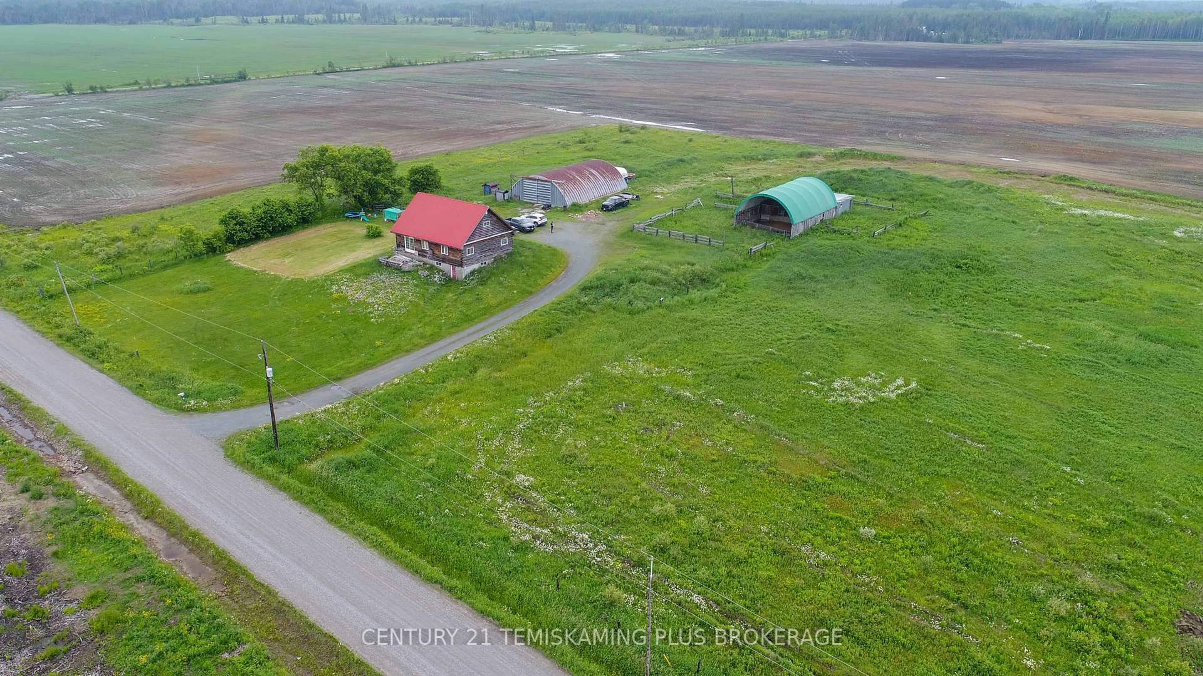 A pic from outside/outdoor area/front of a property/back of a property/a pic from drone, street for 243131 Margueratt Rd, Englehart Ontario P0J 1H0