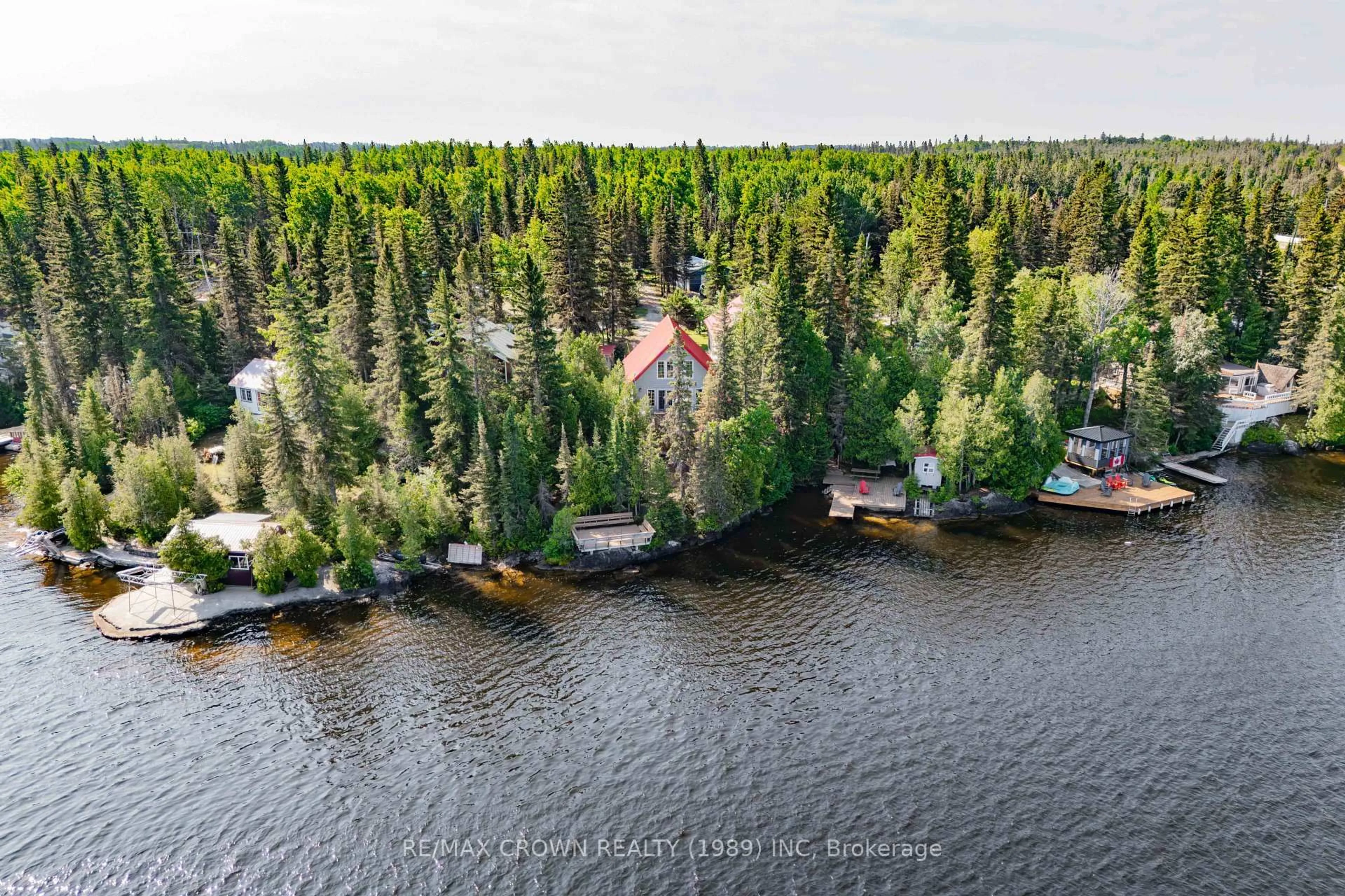 A pic from outside/outdoor area/front of a property/back of a property/a pic from drone, water/lake/river/ocean view for 33 Sailing Club Rd #Moonbeam, Kapuskasing Ontario P0L 1V0