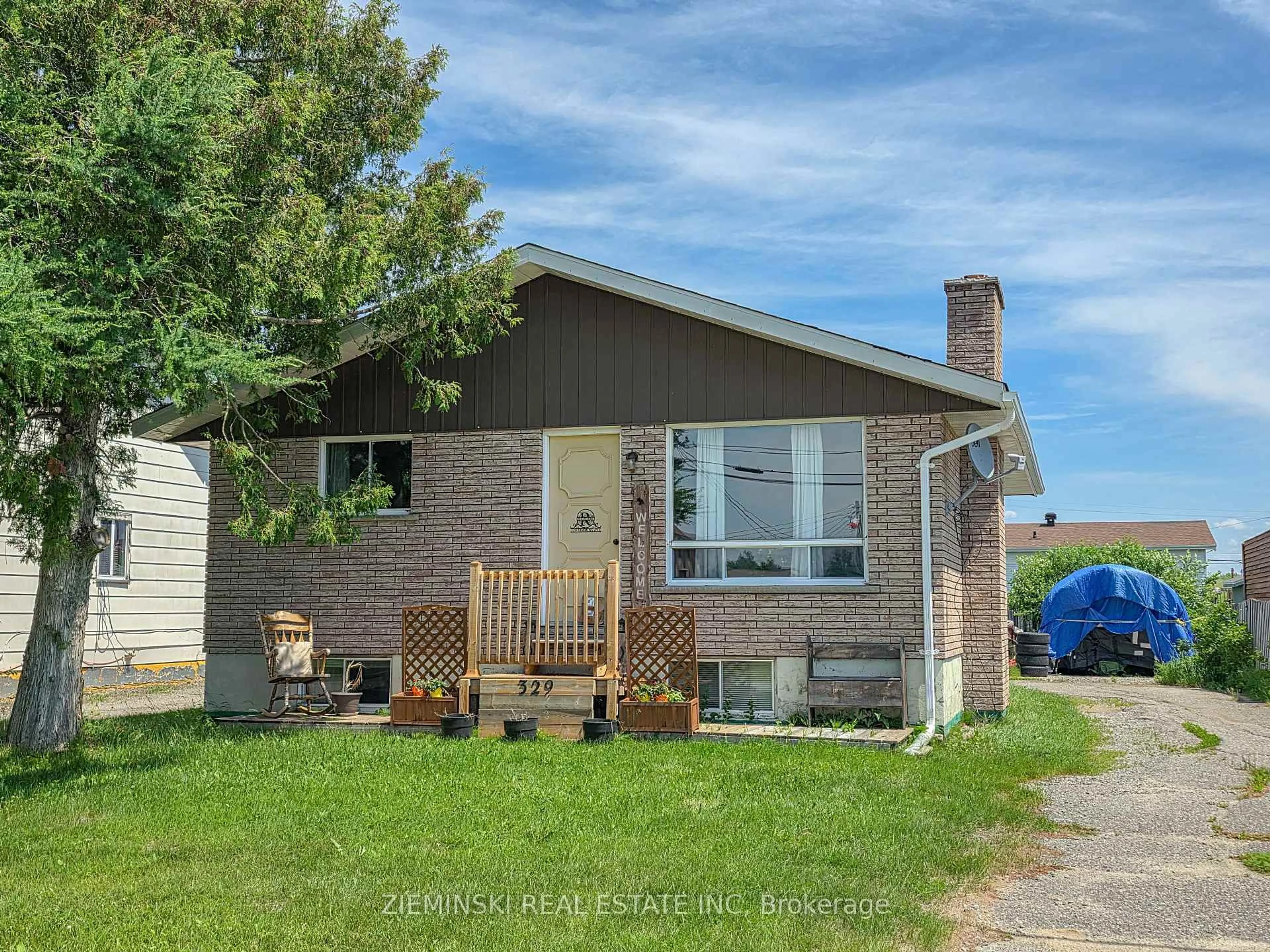 Home with brick exterior material, street for 329 Timmins Ave, Black River-Matheson Ontario P0K 1R0