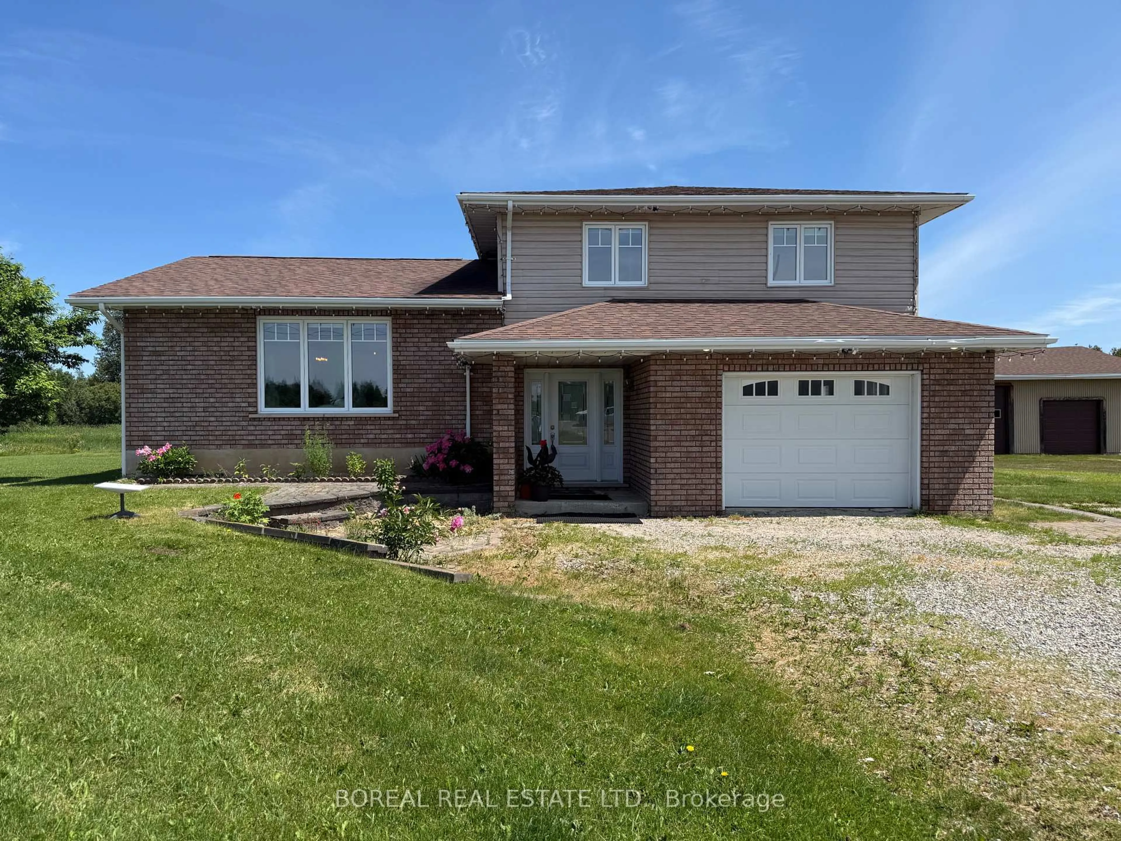 A pic from outside/outdoor area/front of a property/back of a property/a pic from drone, street for 1476 Highway 11, Cochrane Ontario P0L 1C0