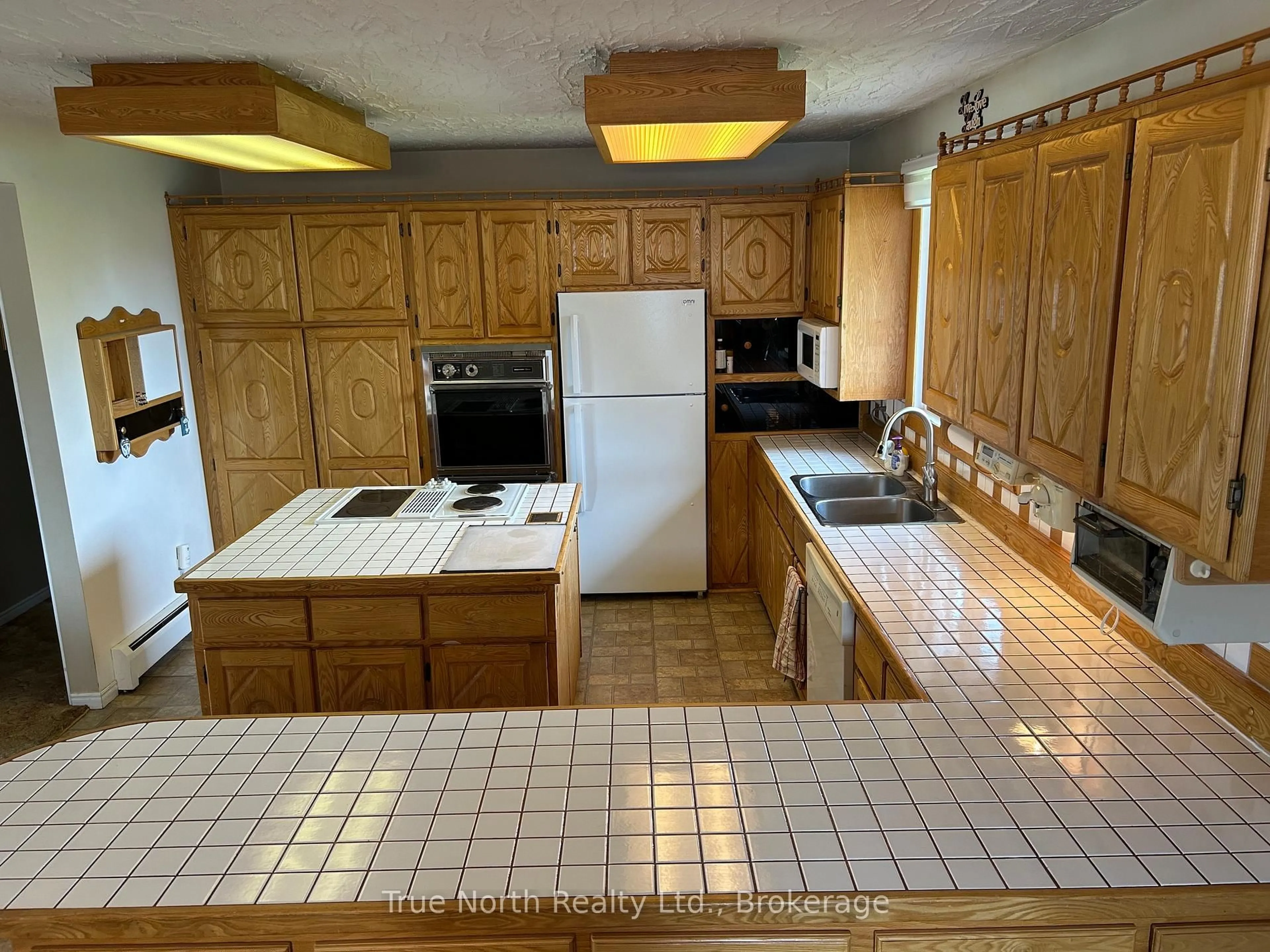 Standard kitchen, ceramic/tile floor for 16 Brock Cres, Kapuskasing Ontario P5N 2J8