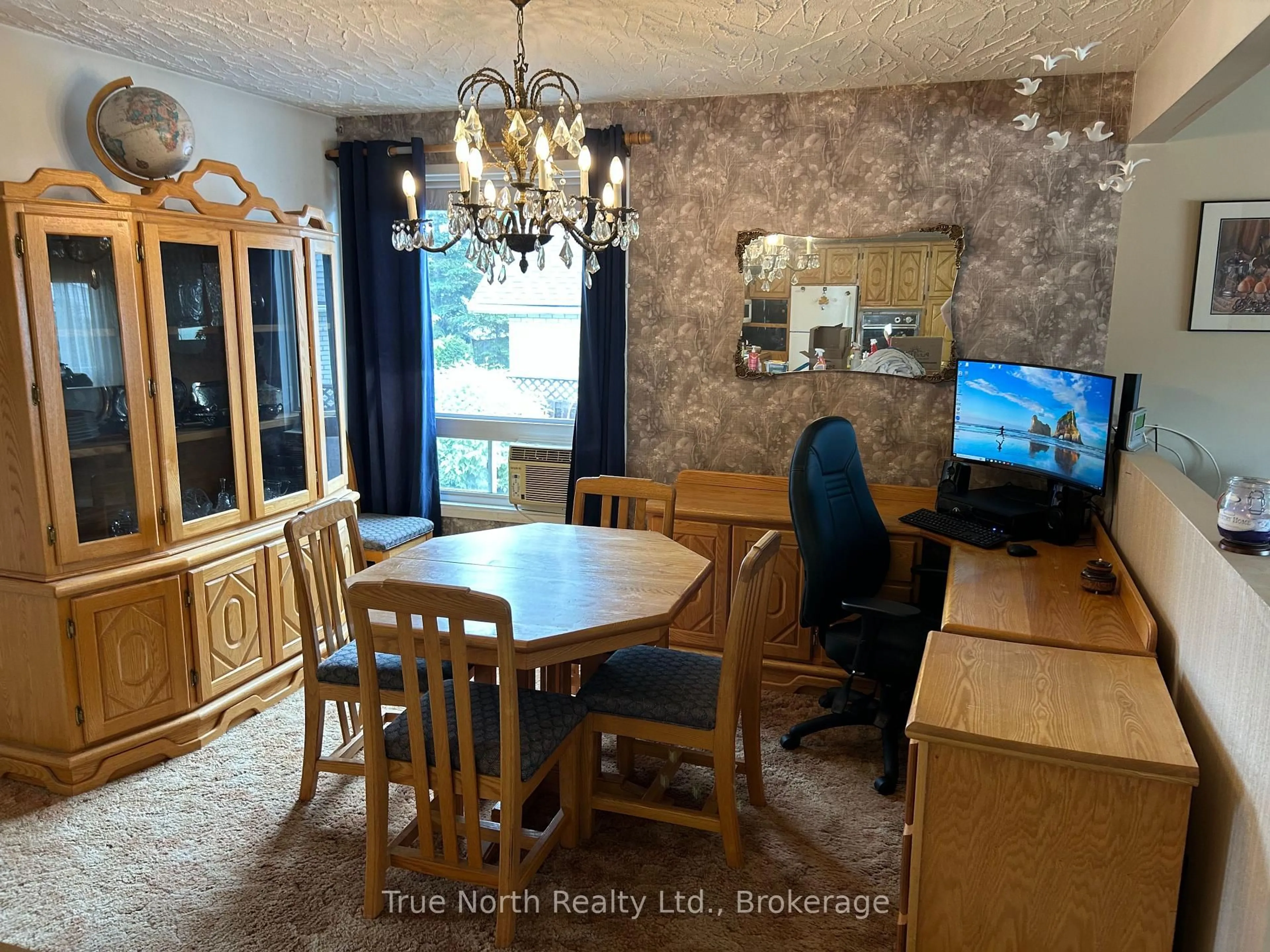 Dining room, wood/laminate floor for 16 Brock Cres, Kapuskasing Ontario P5N 2J8