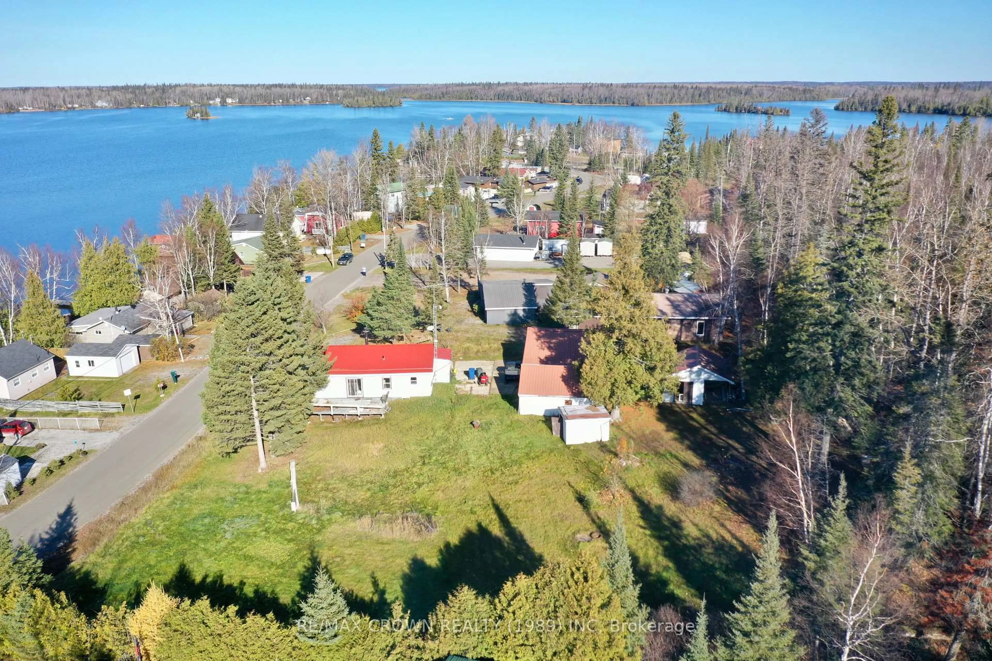 A pic from outside/outdoor area/front of a property/back of a property/a pic from drone, water/lake/river/ocean view for 42 Lefebvre Peninsula Rd #Moonbeam, Kapuskasing Ontario P0L 1V0