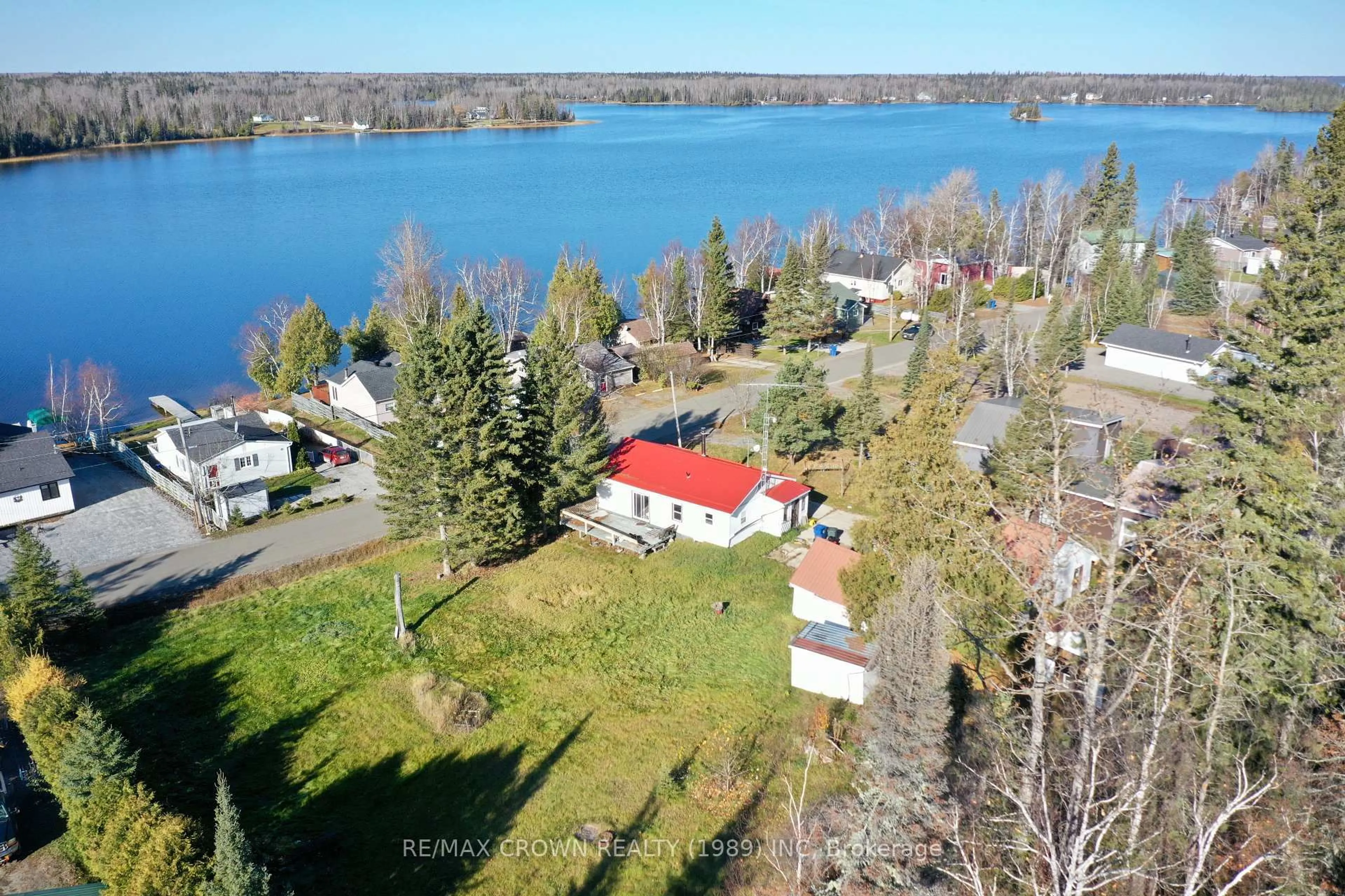 A pic from outside/outdoor area/front of a property/back of a property/a pic from drone, water/lake/river/ocean view for 42 Lefebvre Peninsula Rd #Moonbeam, Kapuskasing Ontario P0L 1V0