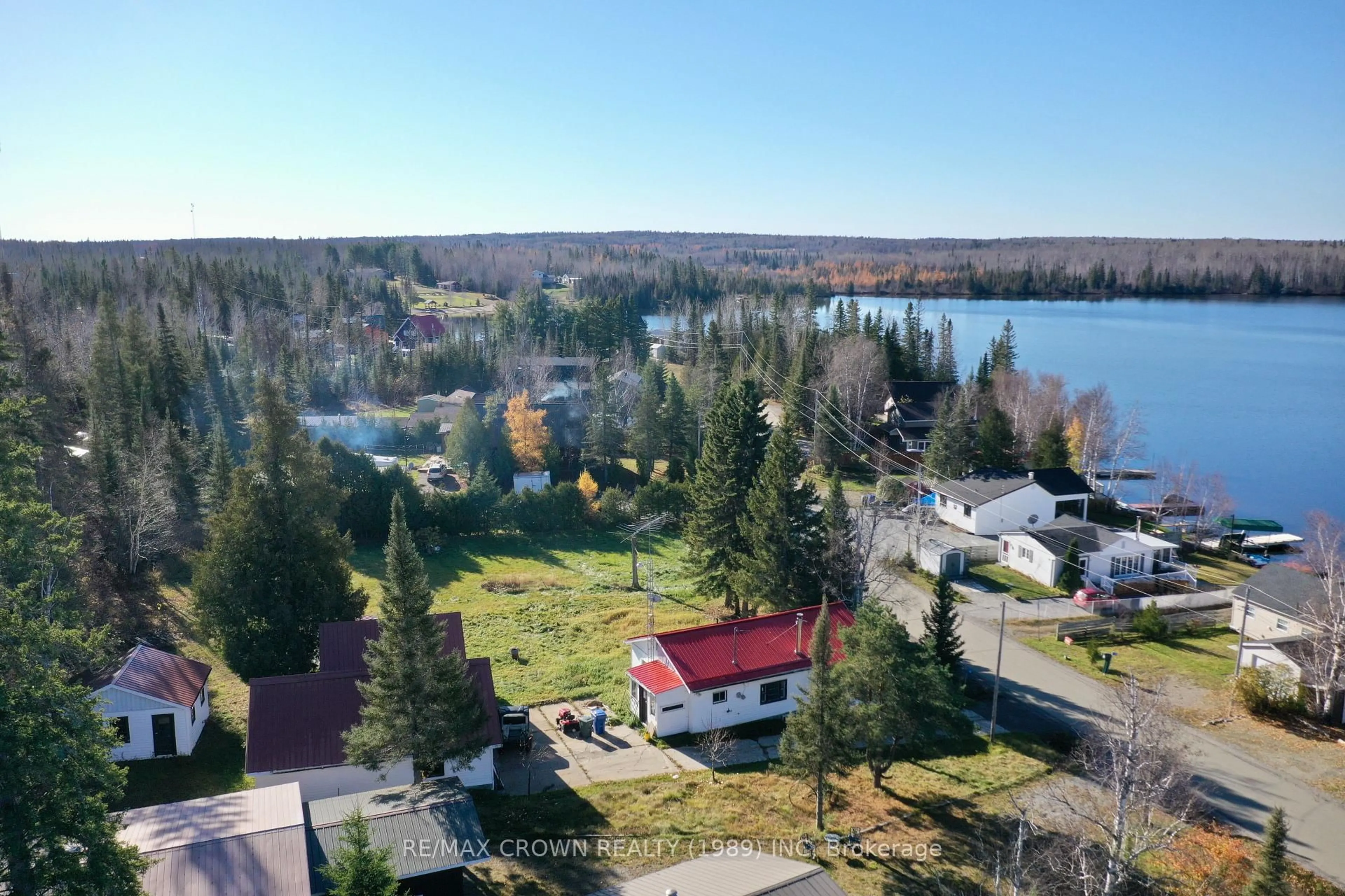 A pic from outside/outdoor area/front of a property/back of a property/a pic from drone, water/lake/river/ocean view for 42 Lefebvre Peninsula Rd #Moonbeam, Kapuskasing Ontario P0L 1V0