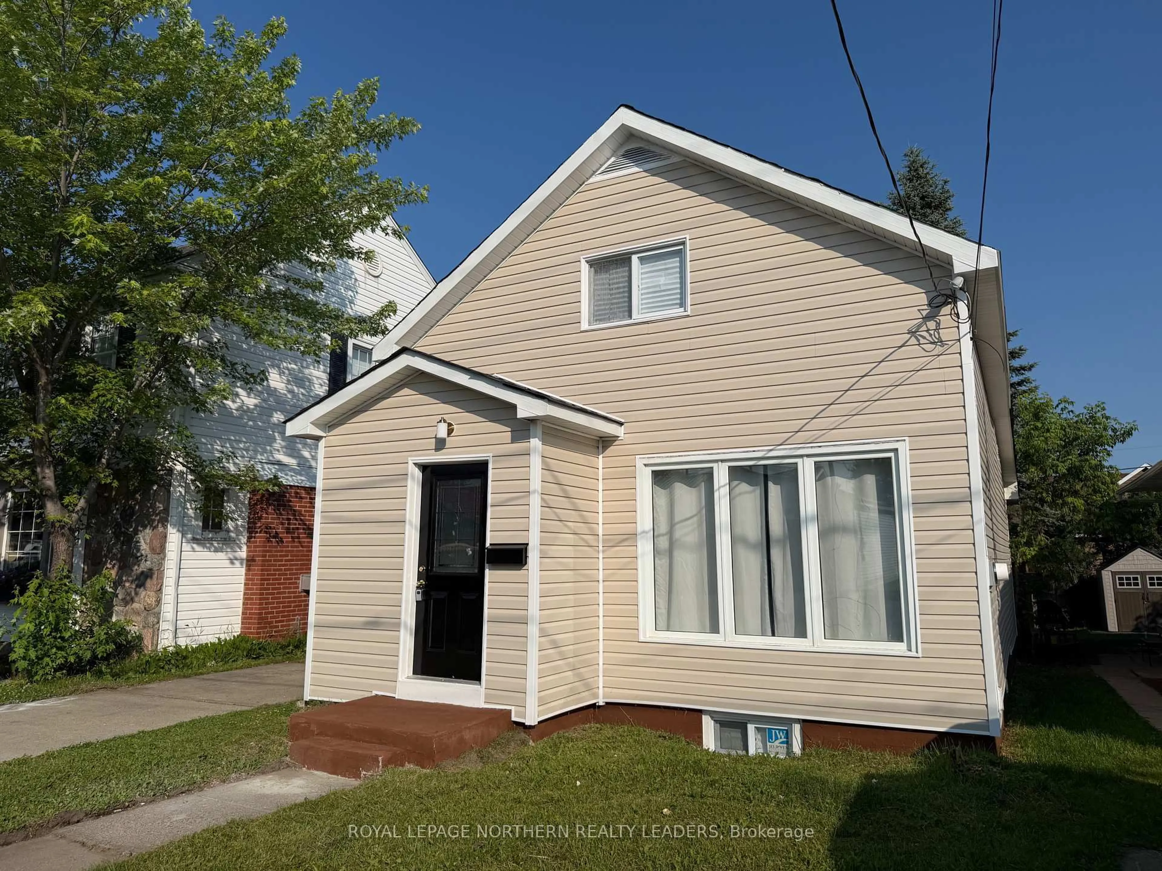Home with vinyl exterior material, street for 251 Toke St, Timmins Ontario P4N 6V4