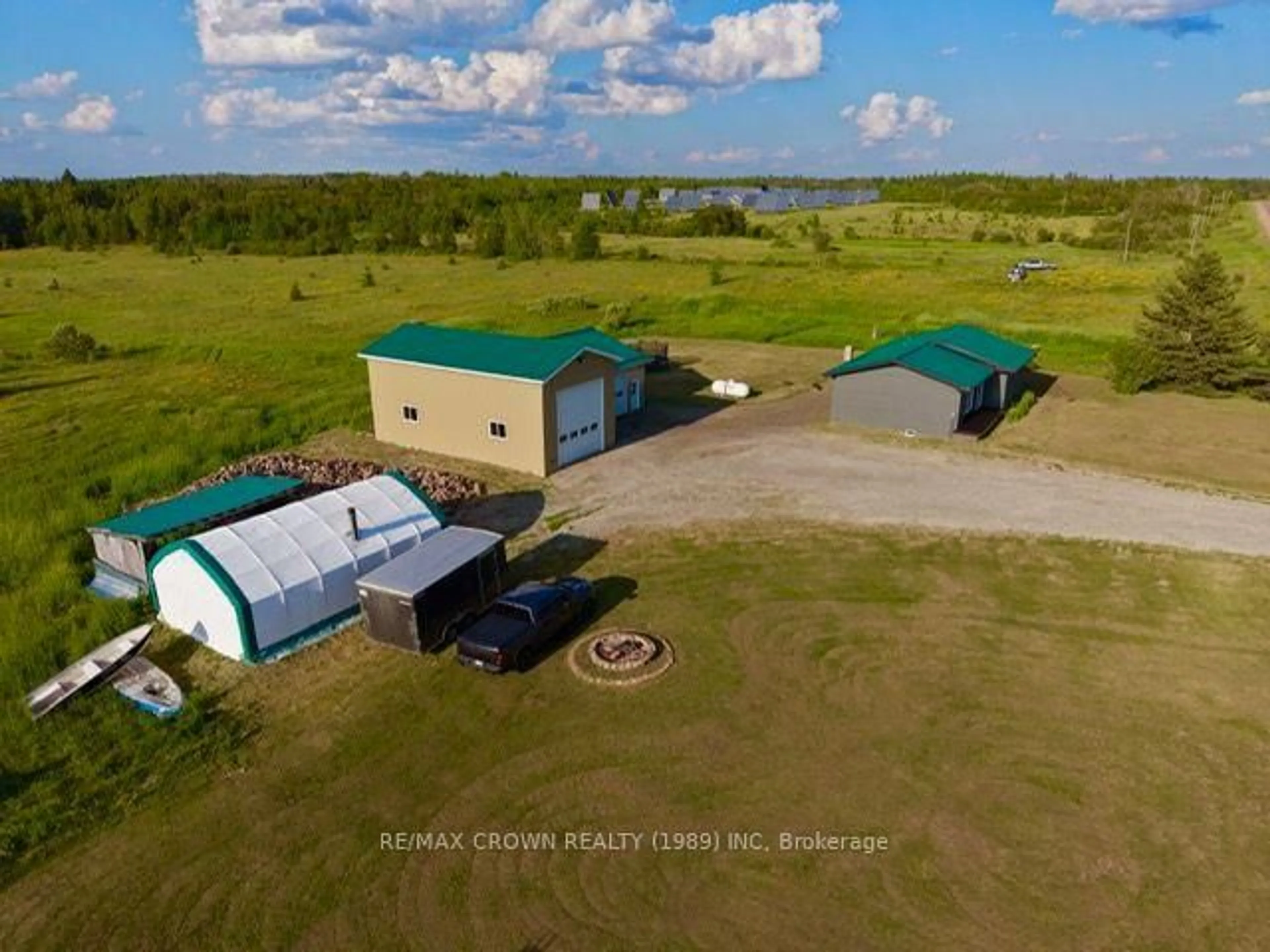 A pic from outside/outdoor area/front of a property/back of a property/a pic from drone, unknown for 198 HIGHWAY 11 Highway, Kapuskasing Ontario P5N 2G0