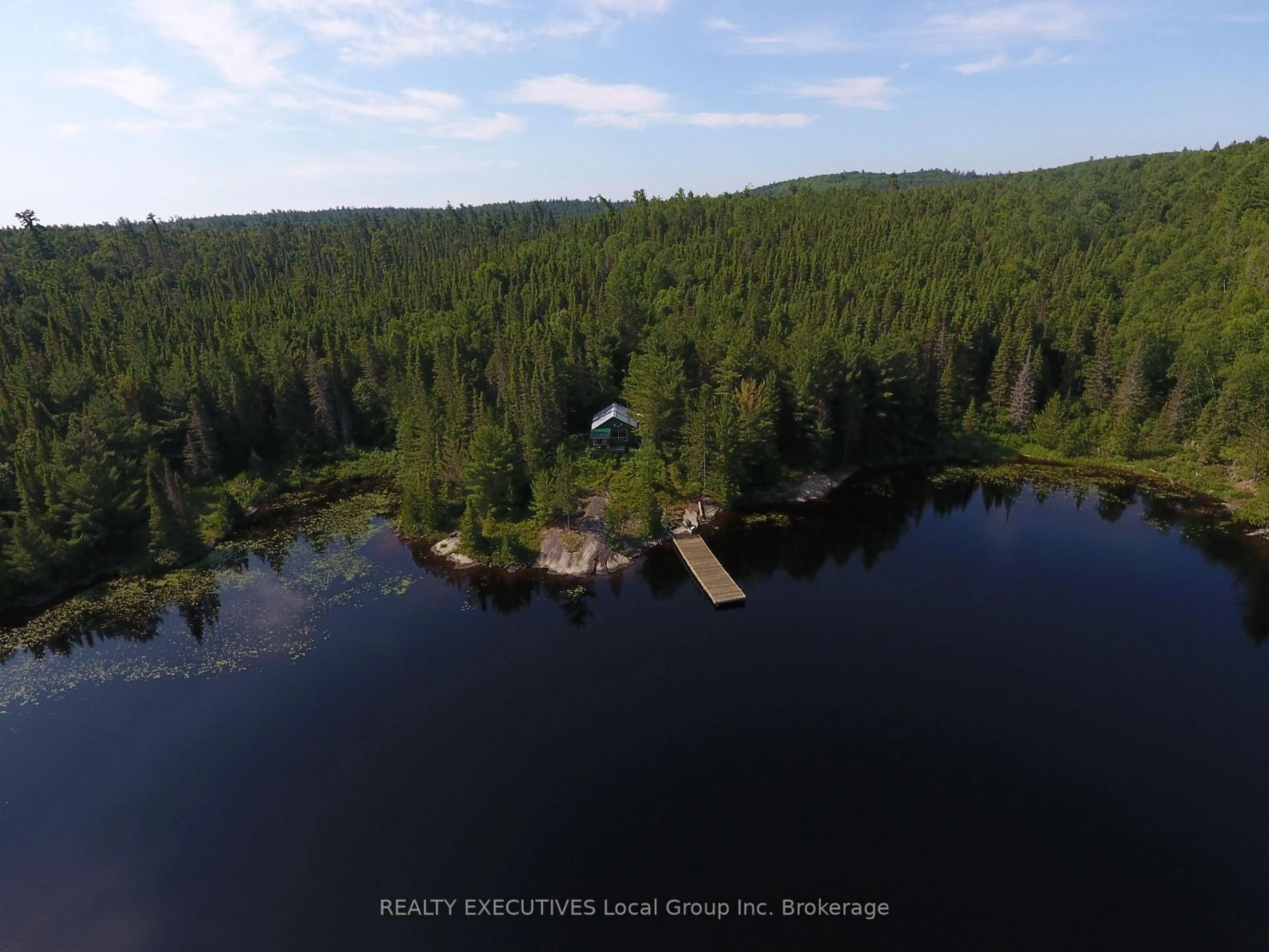 A pic from outside/outdoor area/front of a property/back of a property/a pic from drone, water/lake/river/ocean view for 14965 South Lorrain Pt, Timiskaming Ontario P0H 2H0