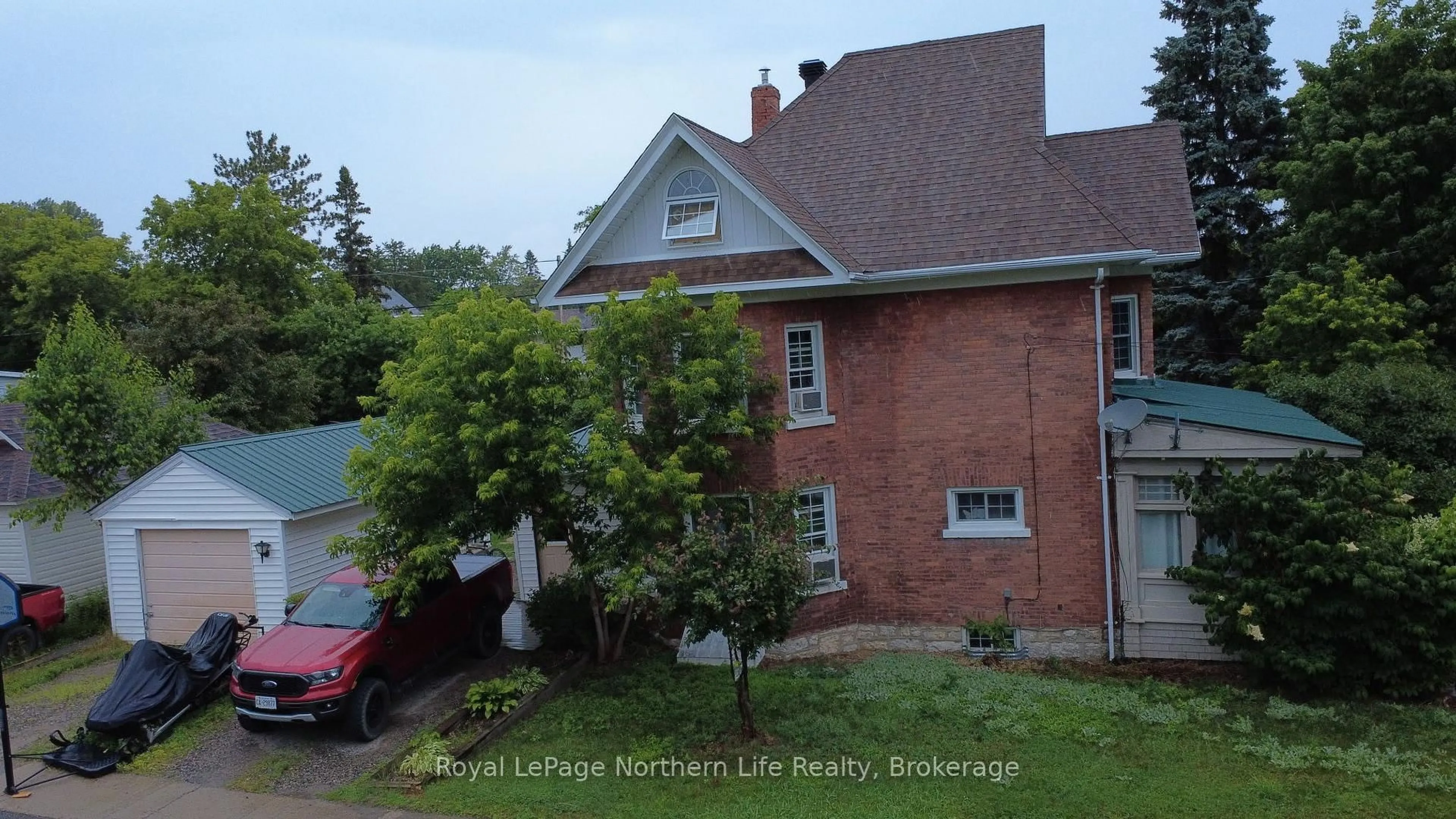 A pic from outside/outdoor area/front of a property/back of a property/a pic from drone, street for 534 RORKE Ave, Temiskaming Shores Ontario P0J 1K0