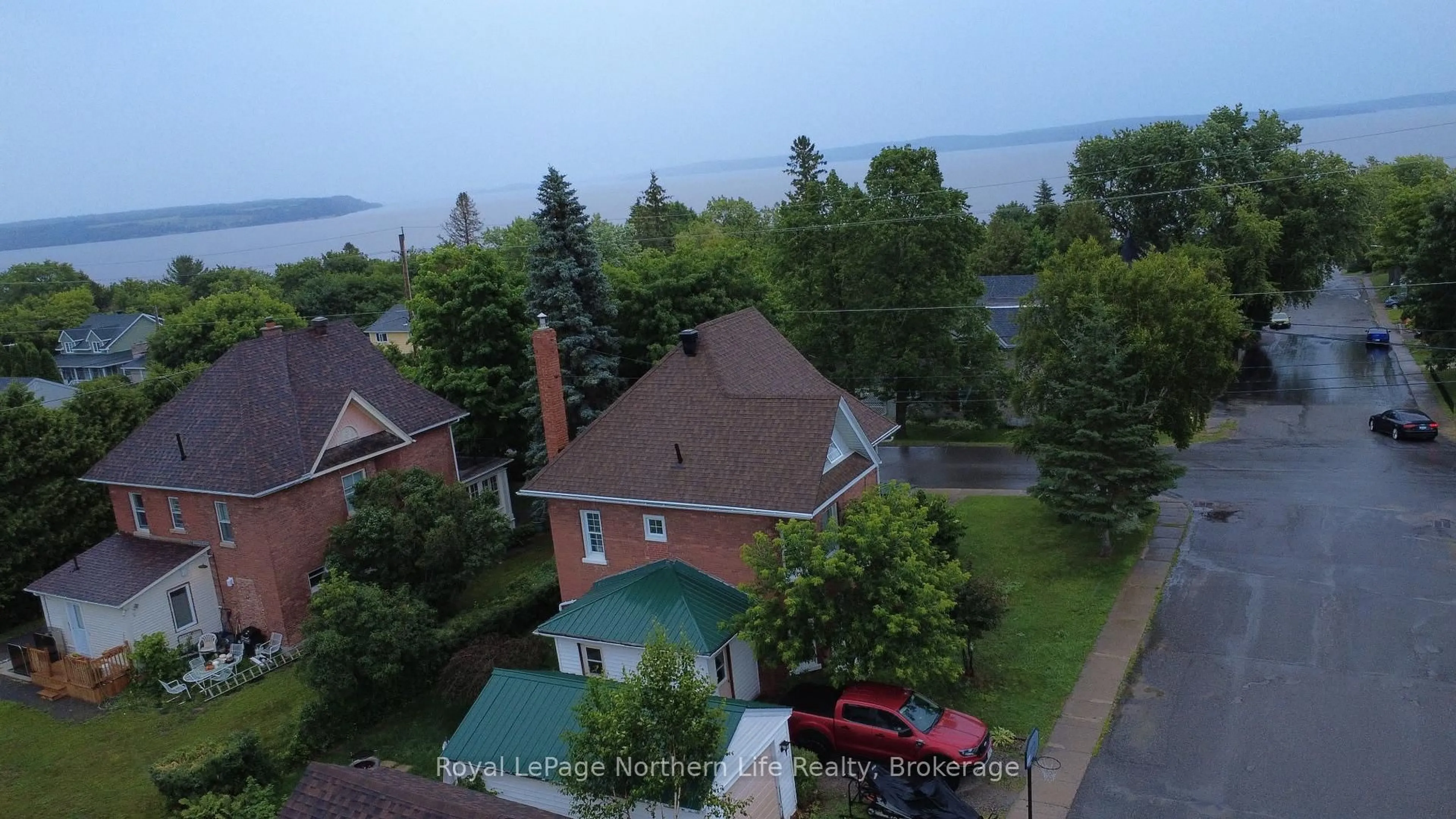A pic from outside/outdoor area/front of a property/back of a property/a pic from drone, water/lake/river/ocean view for 534 RORKE Ave, Temiskaming Shores Ontario P0J 1K0