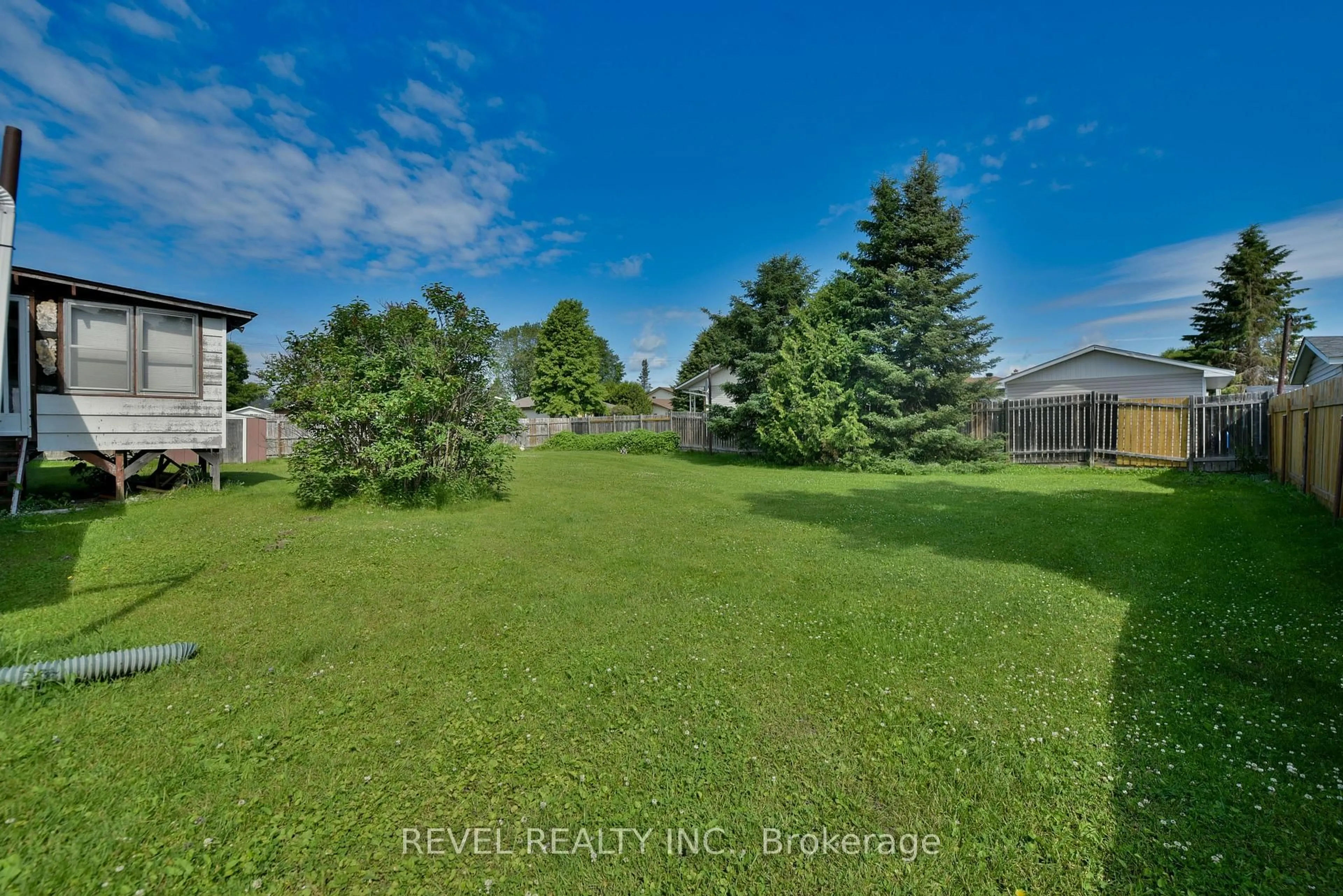 A pic from outside/outdoor area/front of a property/back of a property/a pic from drone, water/lake/river/ocean view for 1330 Chenier Ave, Timmins Ontario P4R 1A9