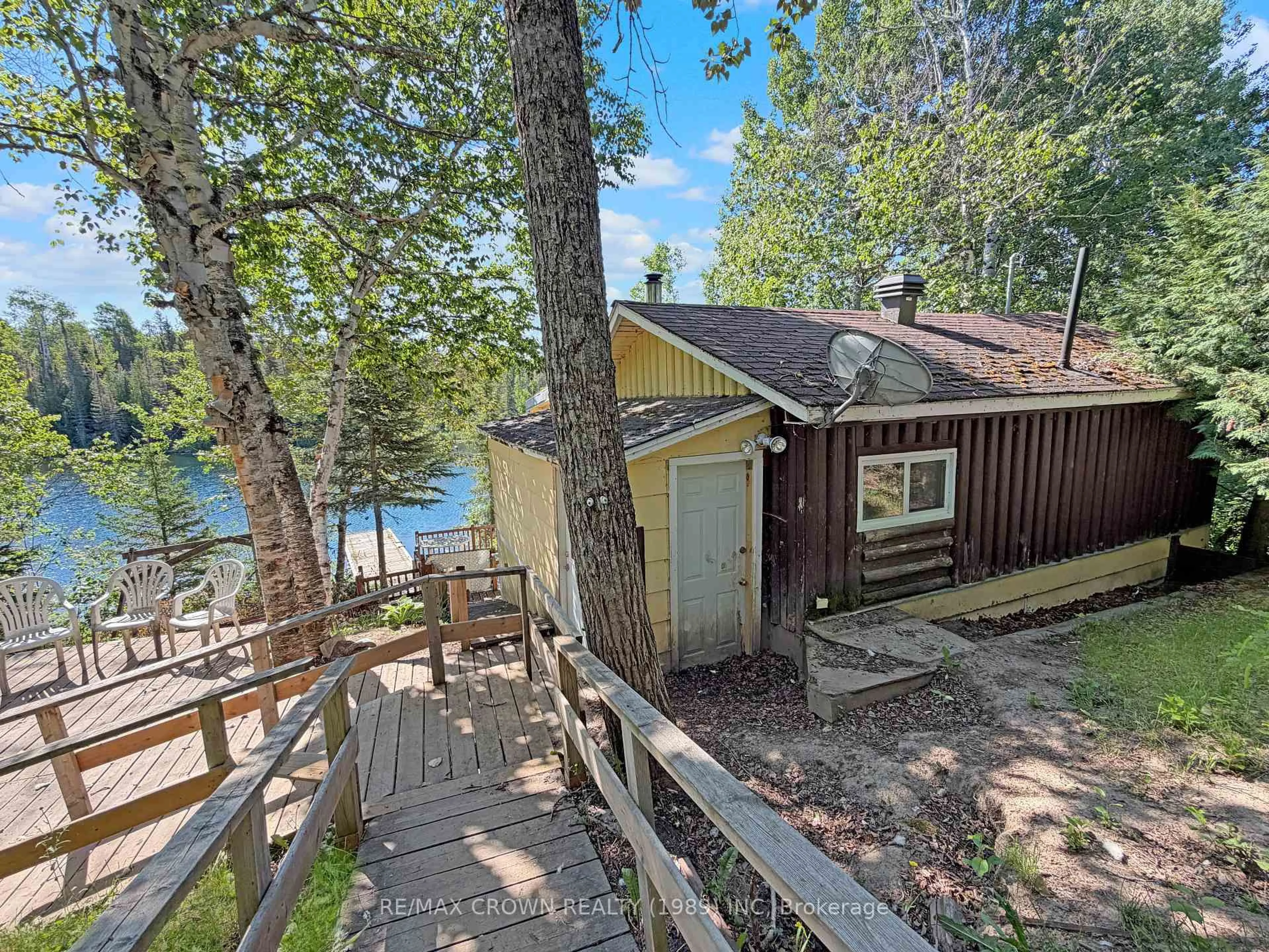 A pic from outside/outdoor area/front of a property/back of a property/a pic from drone, water/lake/river/ocean view for 22 Chain Of Lakes Rd #Moonbeam, Kapuskasing Ontario P0L 1V0