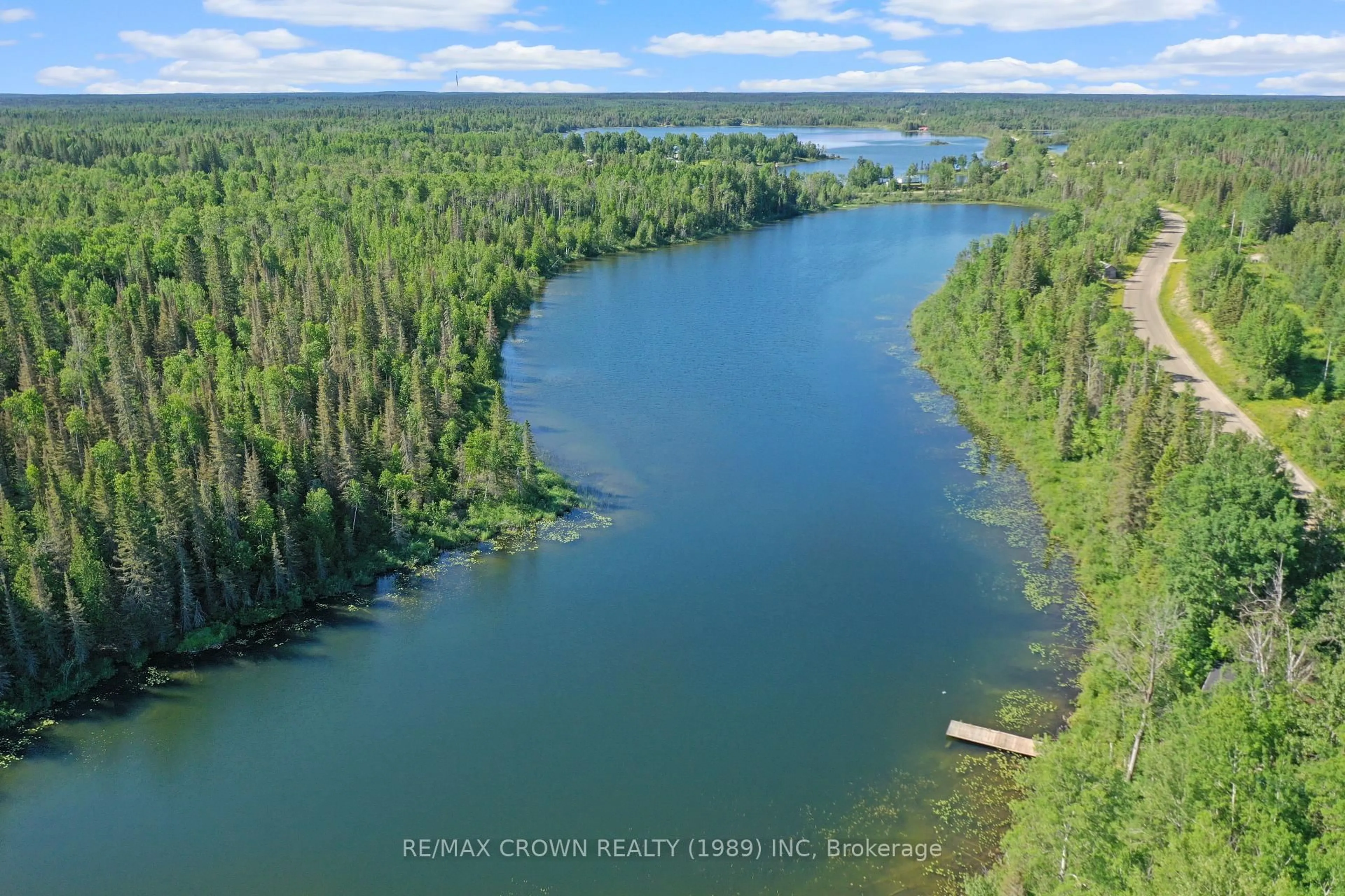 A pic from outside/outdoor area/front of a property/back of a property/a pic from drone, water/lake/river/ocean view for 22 Chain Of Lakes Rd #Moonbeam, Kapuskasing Ontario P0L 1V0