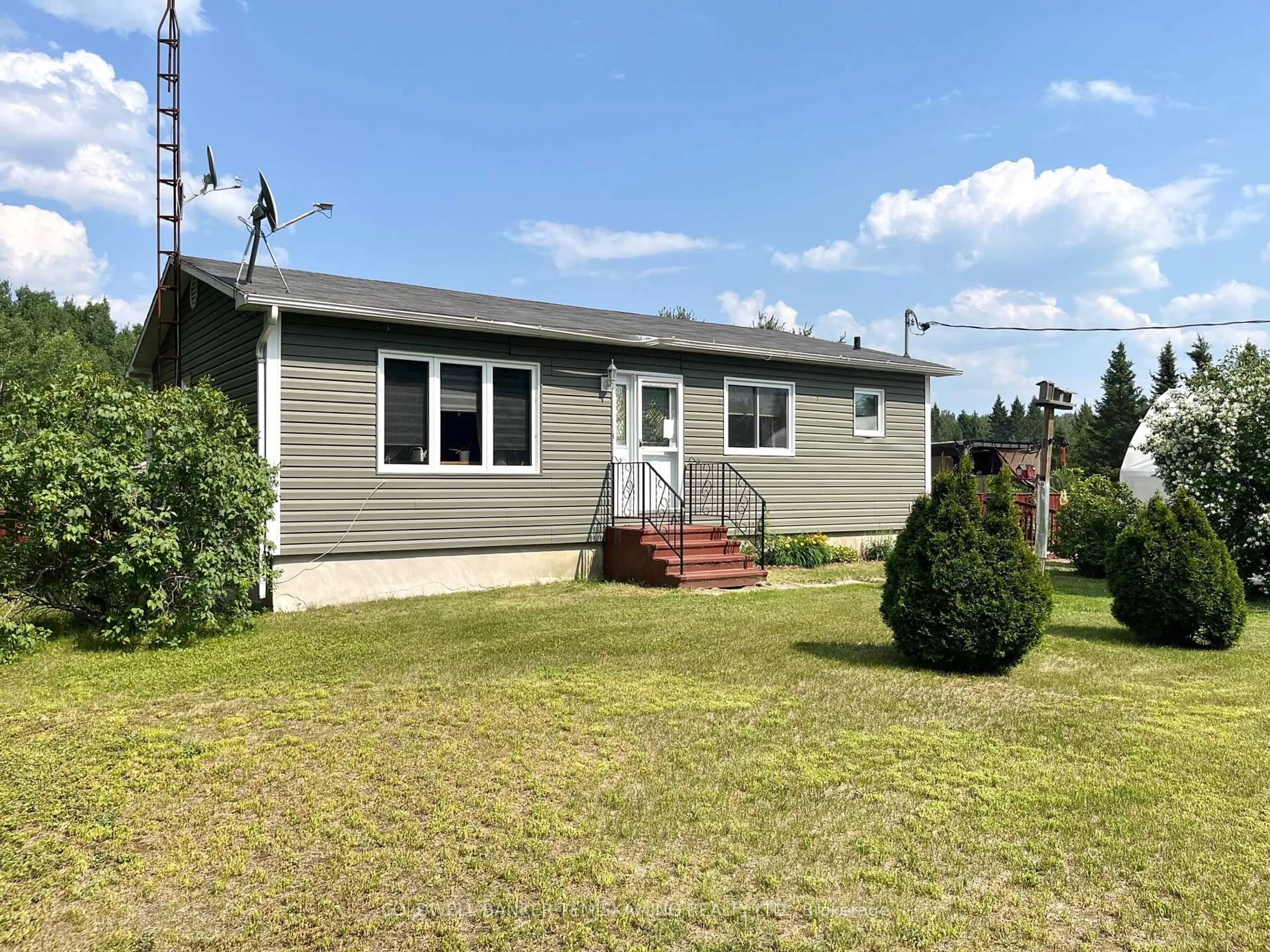 Home with vinyl exterior material, street for 937819 Marsh Bay Rd, Coleman Ontario P0J 1C0