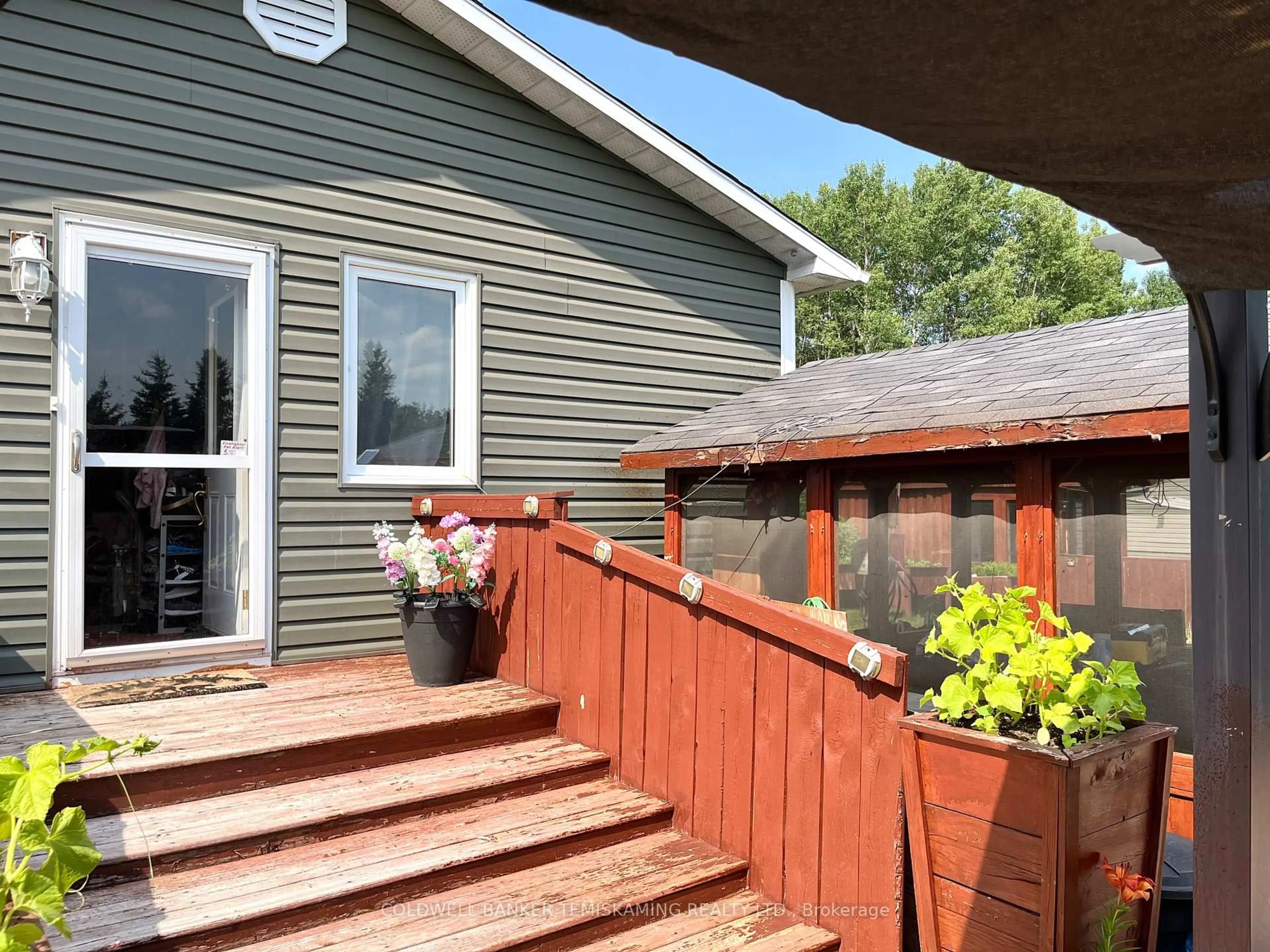 Home with vinyl exterior material, street for 937819 Marsh Bay Rd, Coleman Ontario P0J 1C0