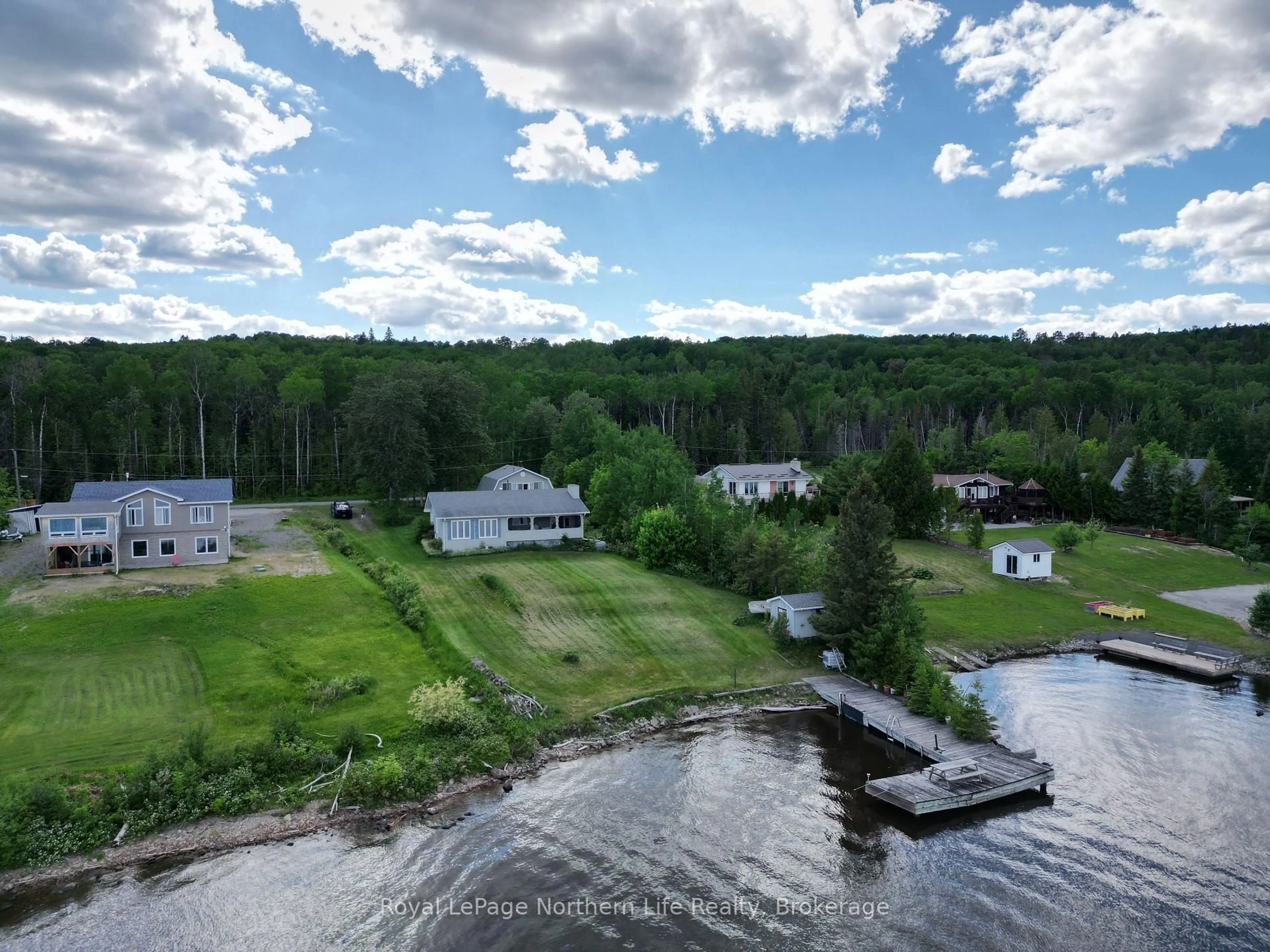 A pic from outside/outdoor area/front of a property/back of a property/a pic from drone, water/lake/river/ocean view for 501182 Berry Rd, Timiskaming Ontario P0J 1R0