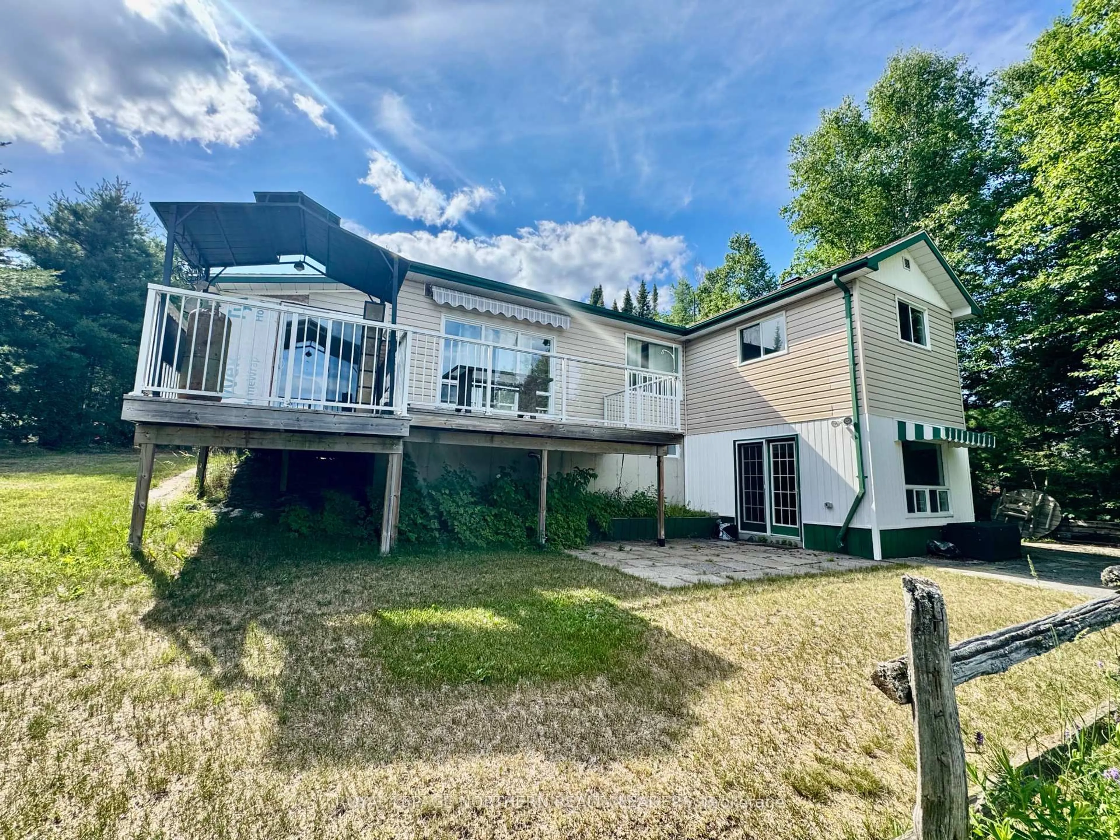 A pic from outside/outdoor area/front of a property/back of a property/a pic from drone, building for 10 Sewell Lake Rd, Timmins Ontario P4N 7K2