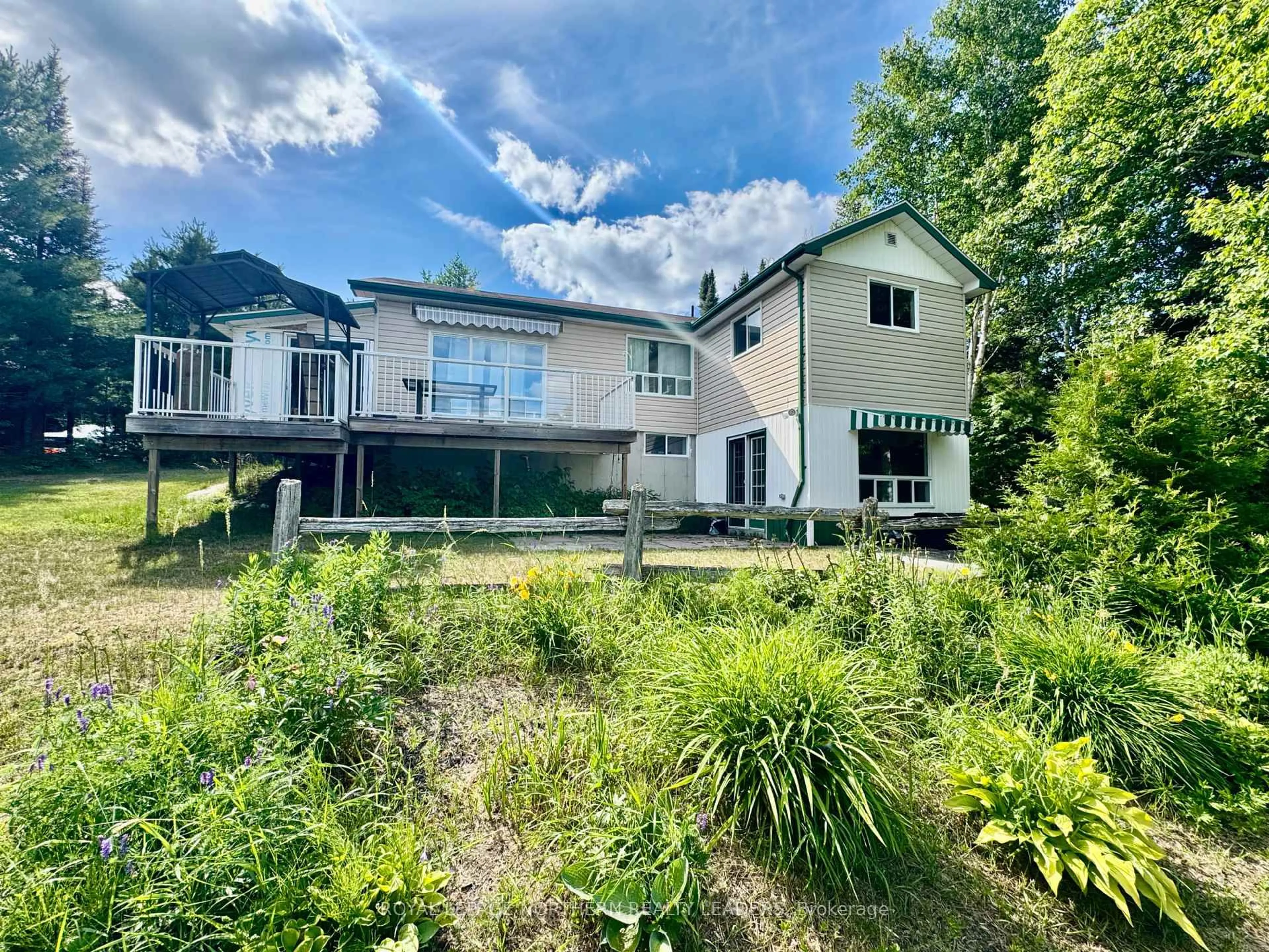 A pic from outside/outdoor area/front of a property/back of a property/a pic from drone, unknown for 10 Sewell Lake Rd, Timmins Ontario P4N 7K2