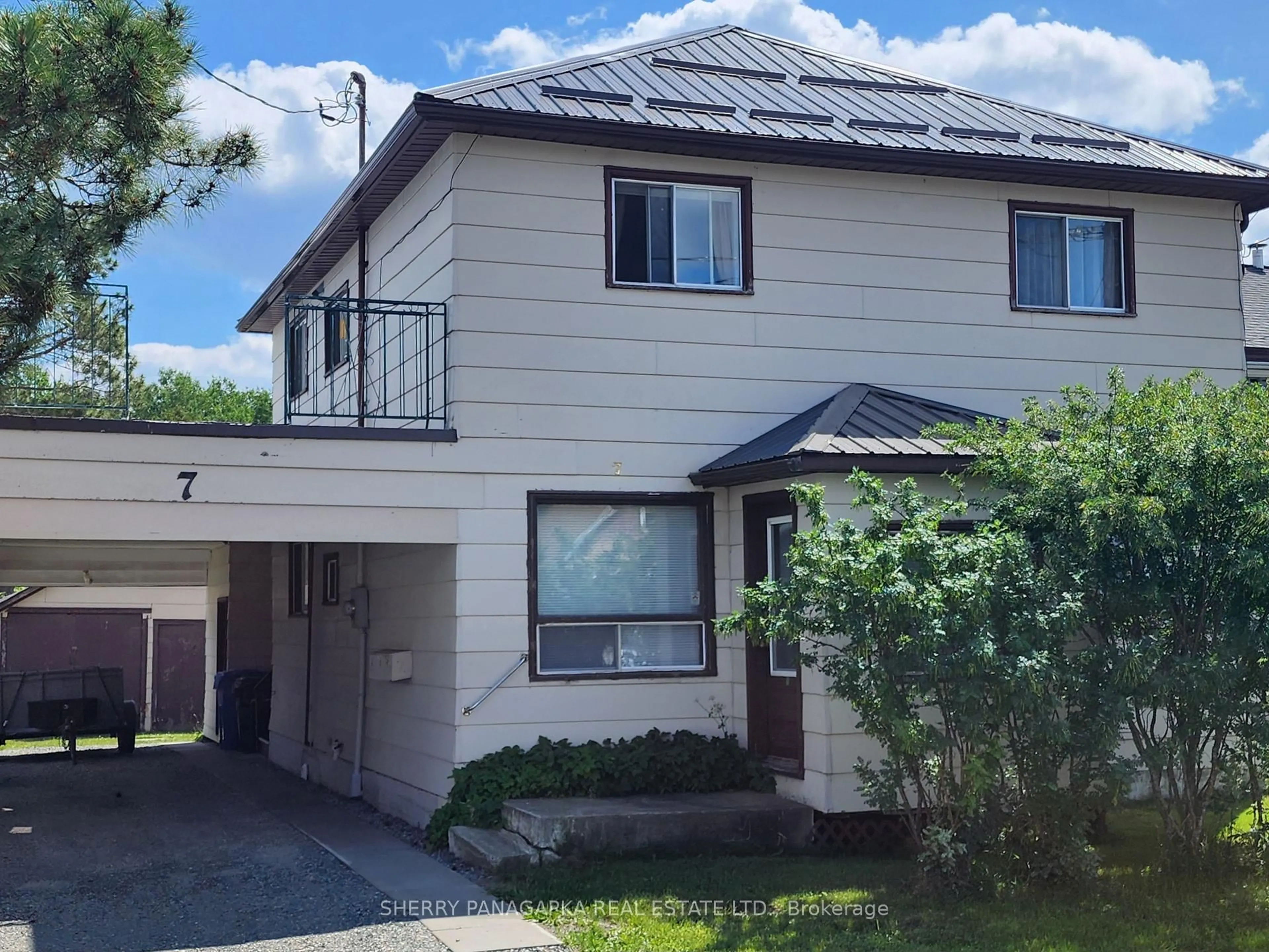 Home with vinyl exterior material, street for 7 Federal St, Kirkland Lake Ontario P2N 1E4