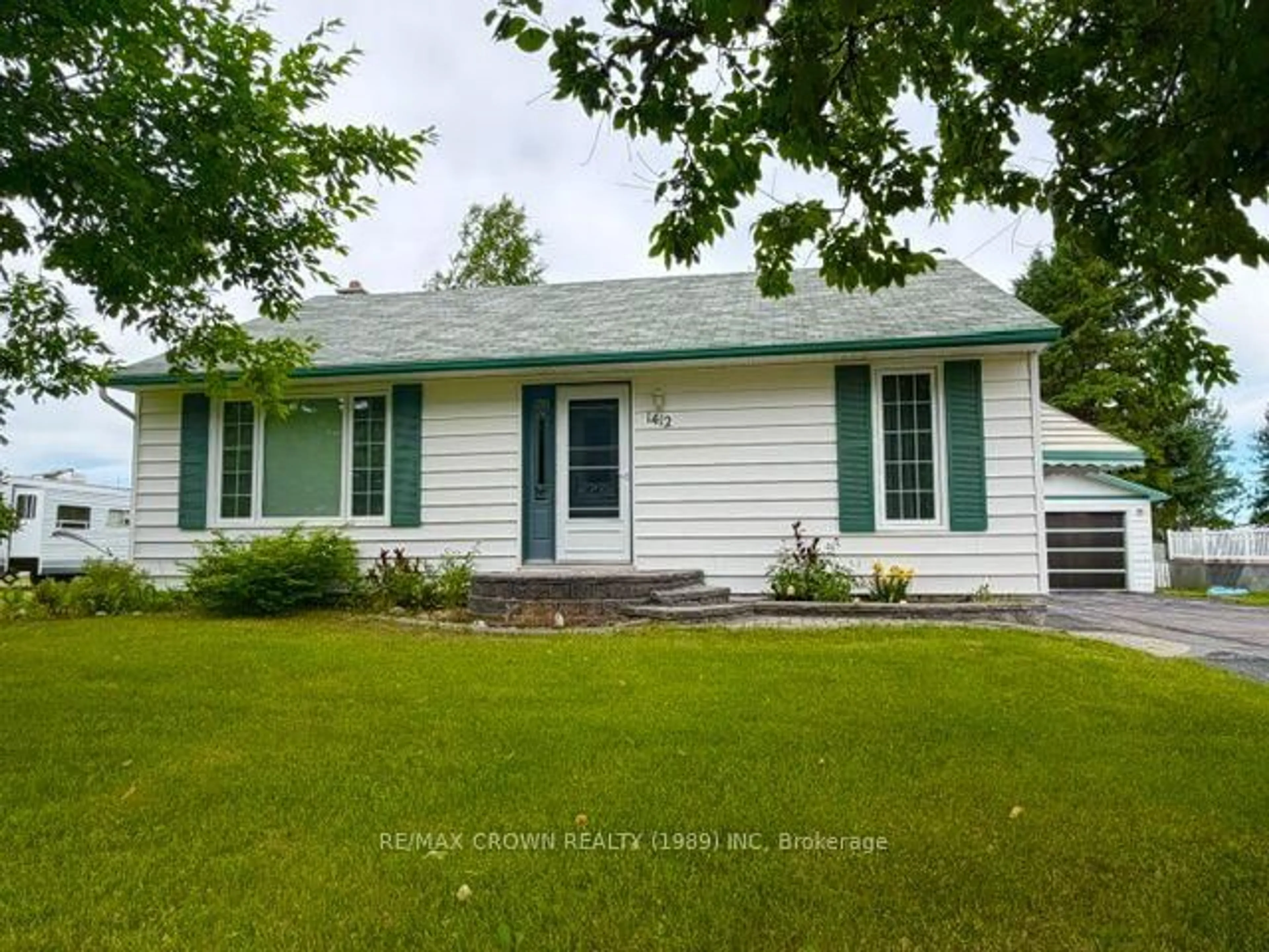 Home with vinyl exterior material, street for 1412 Prince St, Hearst Ontario P0L 1N0