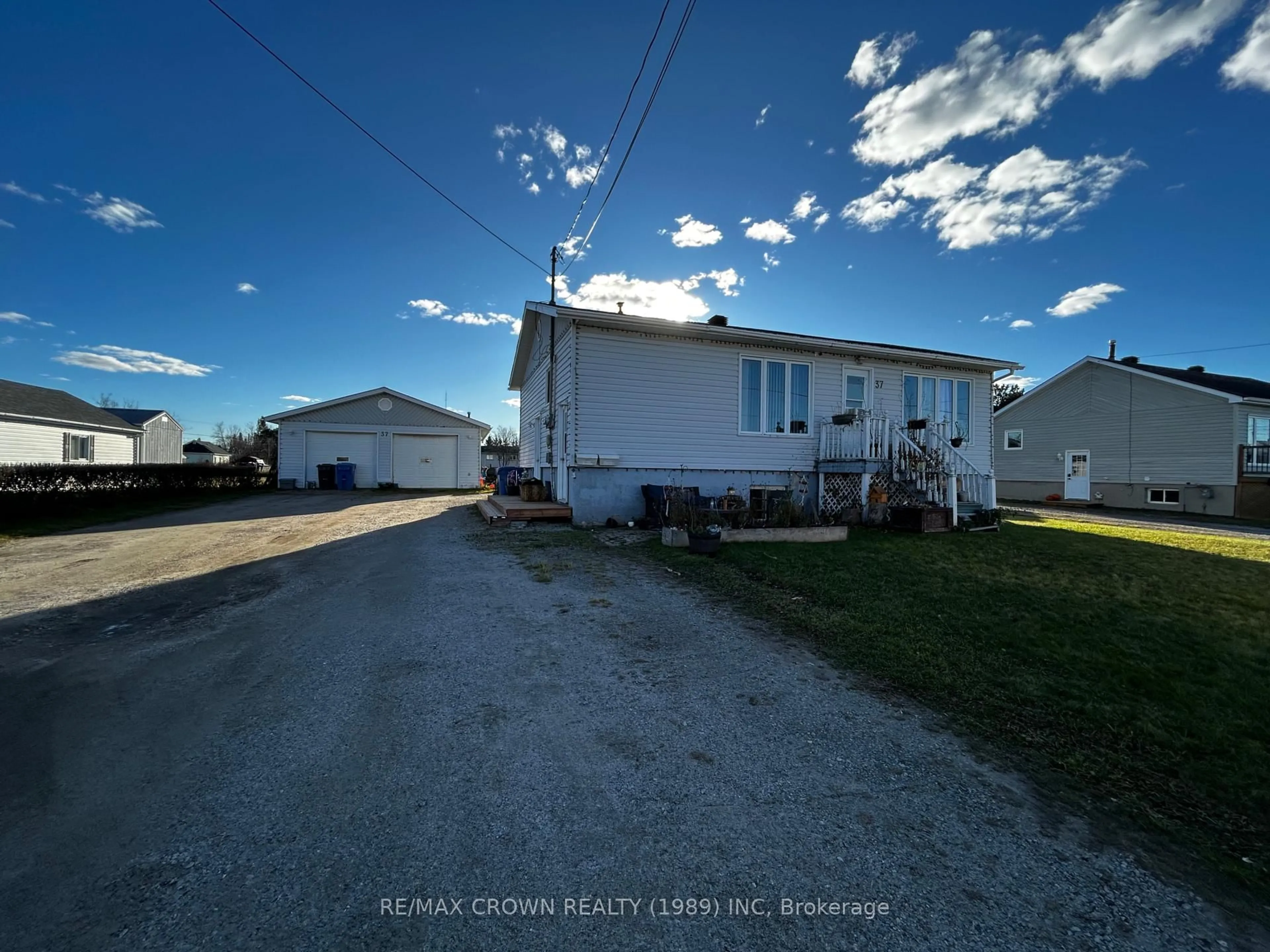 A pic from outside/outdoor area/front of a property/back of a property/a pic from drone, water/lake/river/ocean view for 37 De L'etang Blvd, Kapuskasing Ontario P5N 2M6