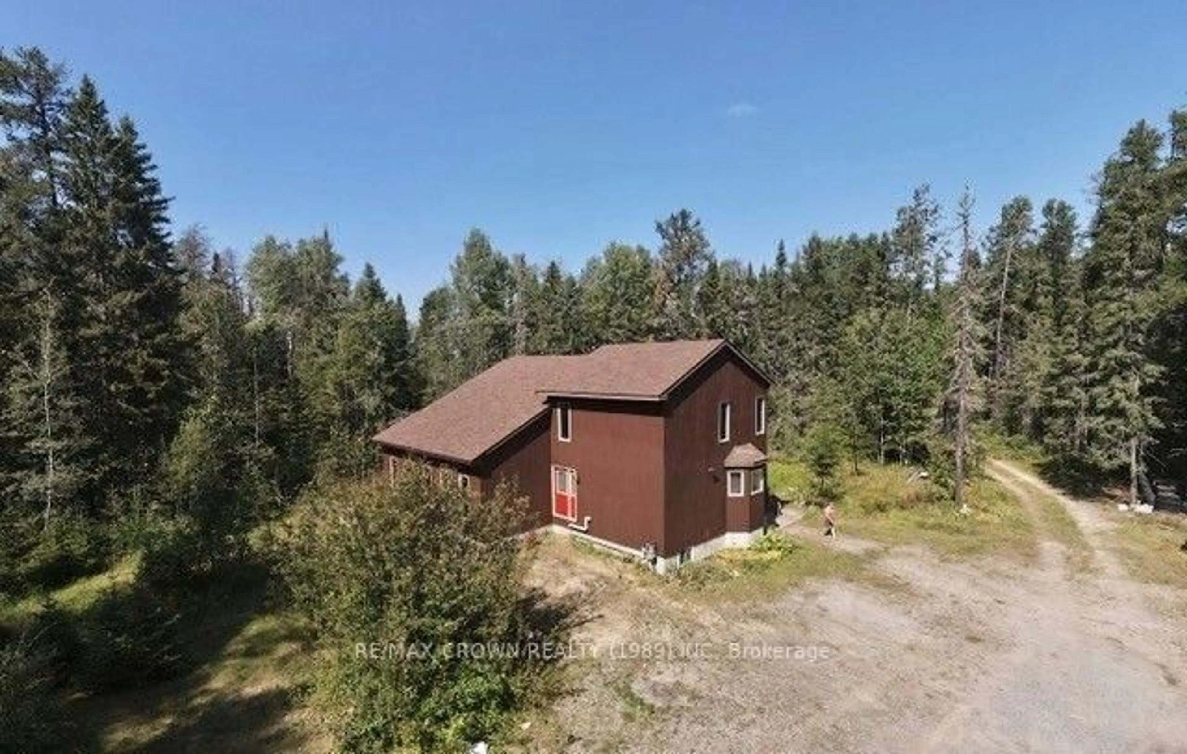 A pic from outside/outdoor area/front of a property/back of a property/a pic from drone, unknown for 810 Laforest Rd, Timmins Ontario P4P 7C7