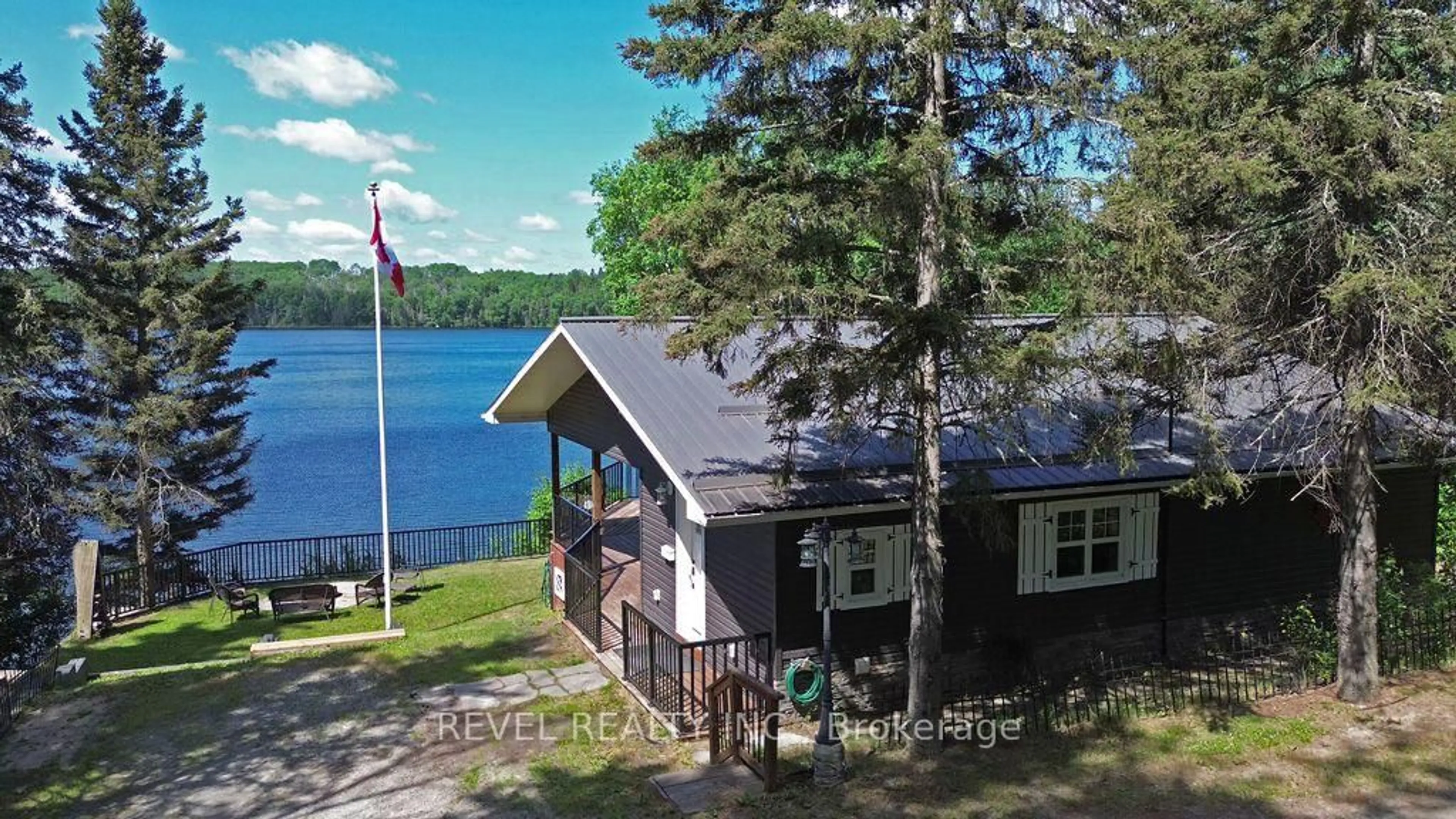 A pic from outside/outdoor area/front of a property/back of a property/a pic from drone, water/lake/river/ocean view for 260 Racicot Rd, Timmins Ontario P0N 1A0