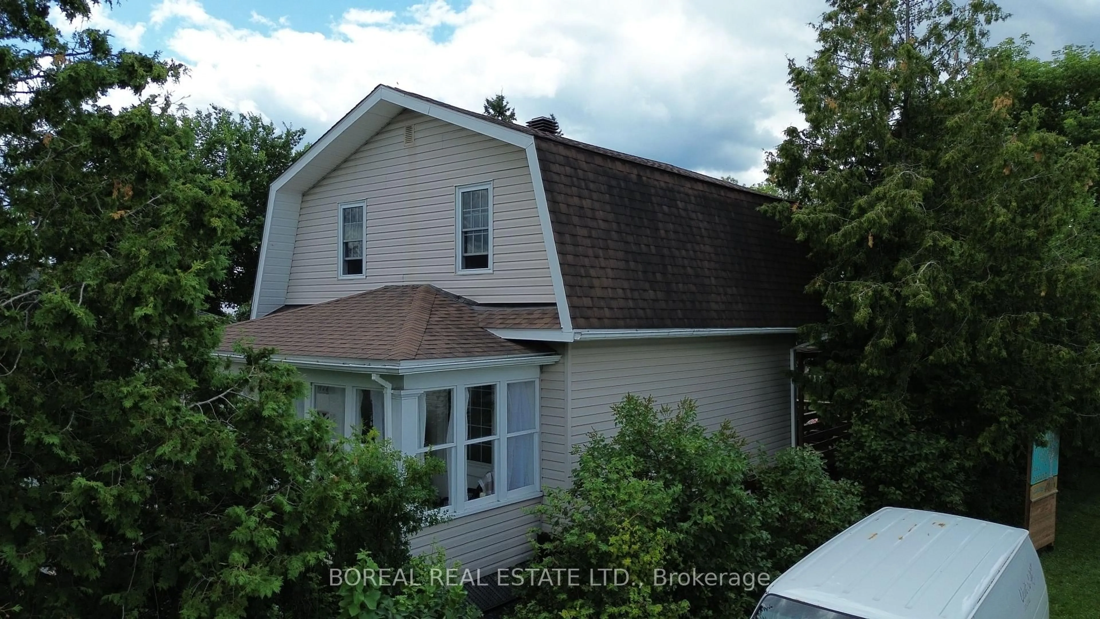 Home with vinyl exterior material, street for 221 Fifth Ave, Cochrane Ontario P0L 1C0