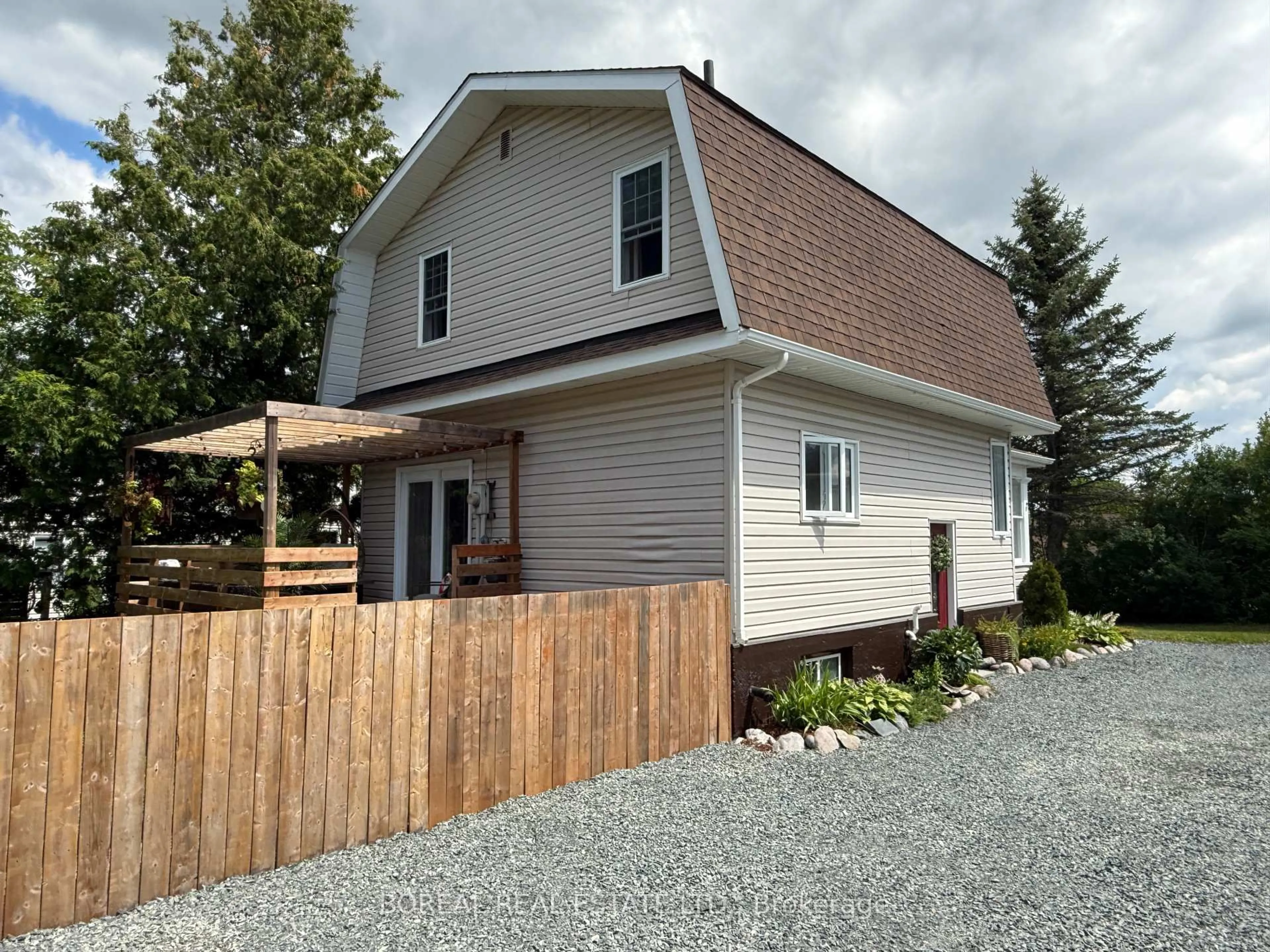 Home with vinyl exterior material, street for 221 Fifth Ave, Cochrane Ontario P0L 1C0