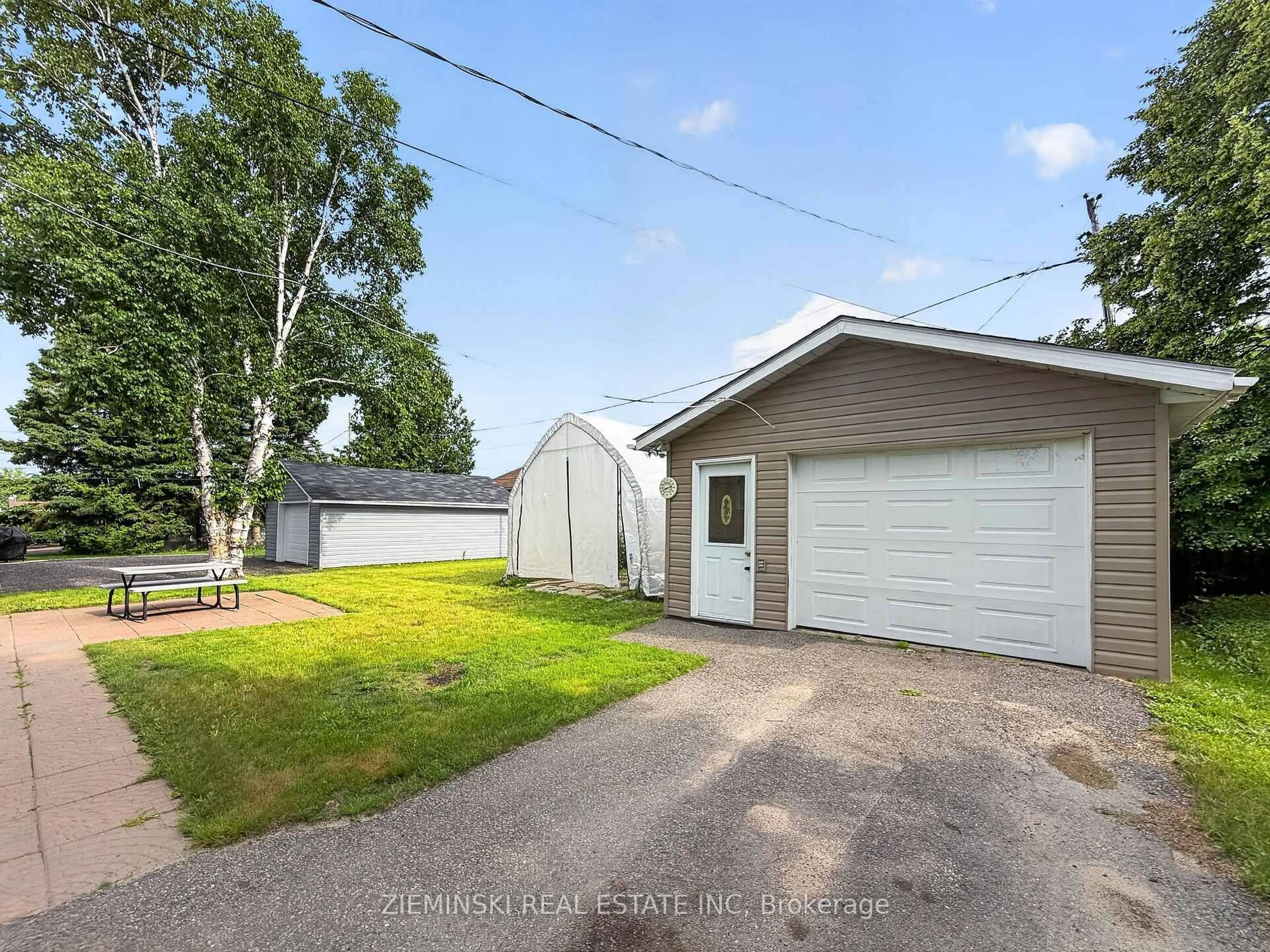 A pic from outside/outdoor area/front of a property/back of a property/a pic from drone, street for 374 Nosov Dr, Iroquois Falls Ontario P0K 1G0
