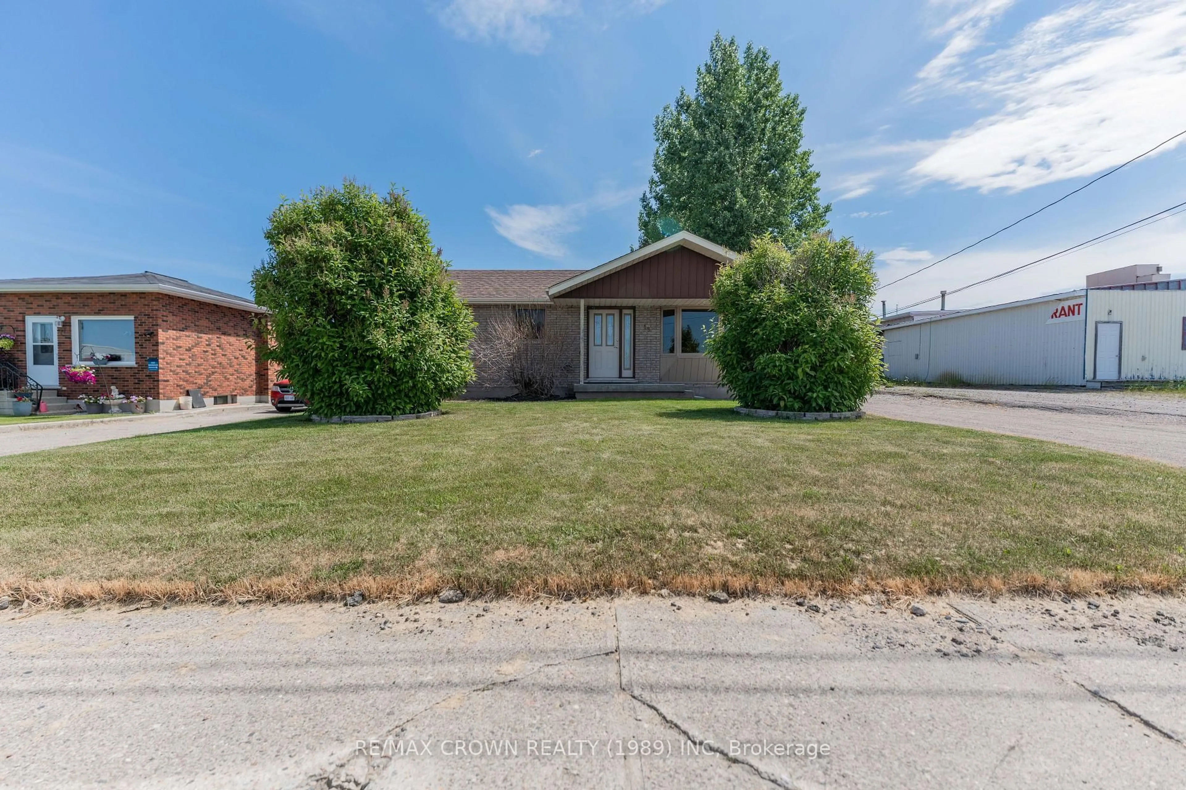 Home with brick exterior material, street for 13 Third St, Smooth Rock Falls Ontario P0L 2B0